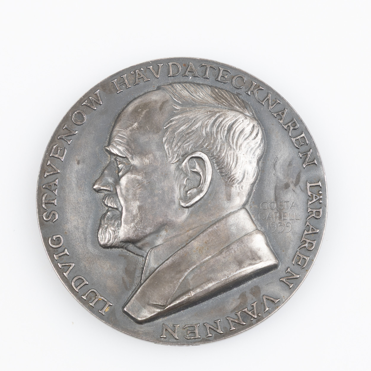 GÖSTA CARELL. MINNESPLAKETT, "Ludvig Stavenow Hävdatecknaren läraren vännen", silver, 1939.