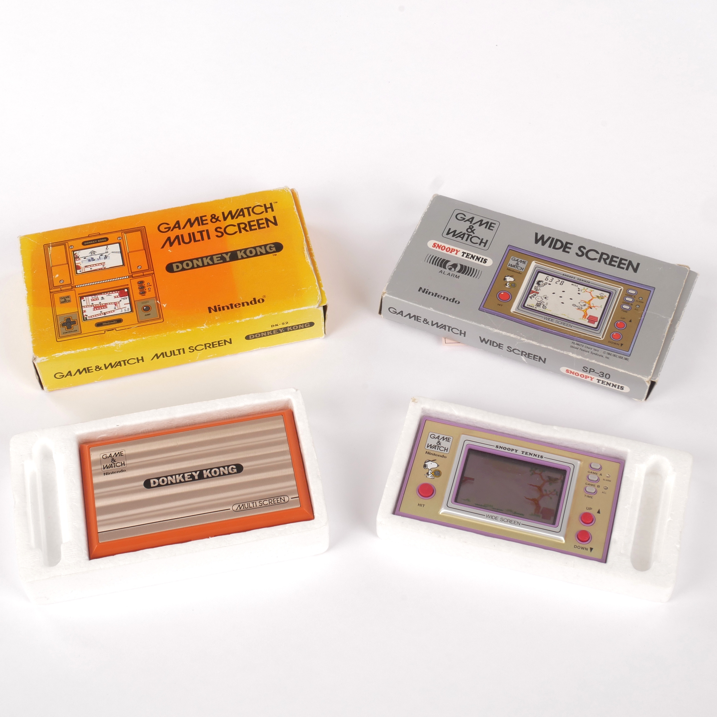 GAME & WATCH. "Donkey Kong" och "Snoopy Tennis", Nintendo, Japan, 1982.