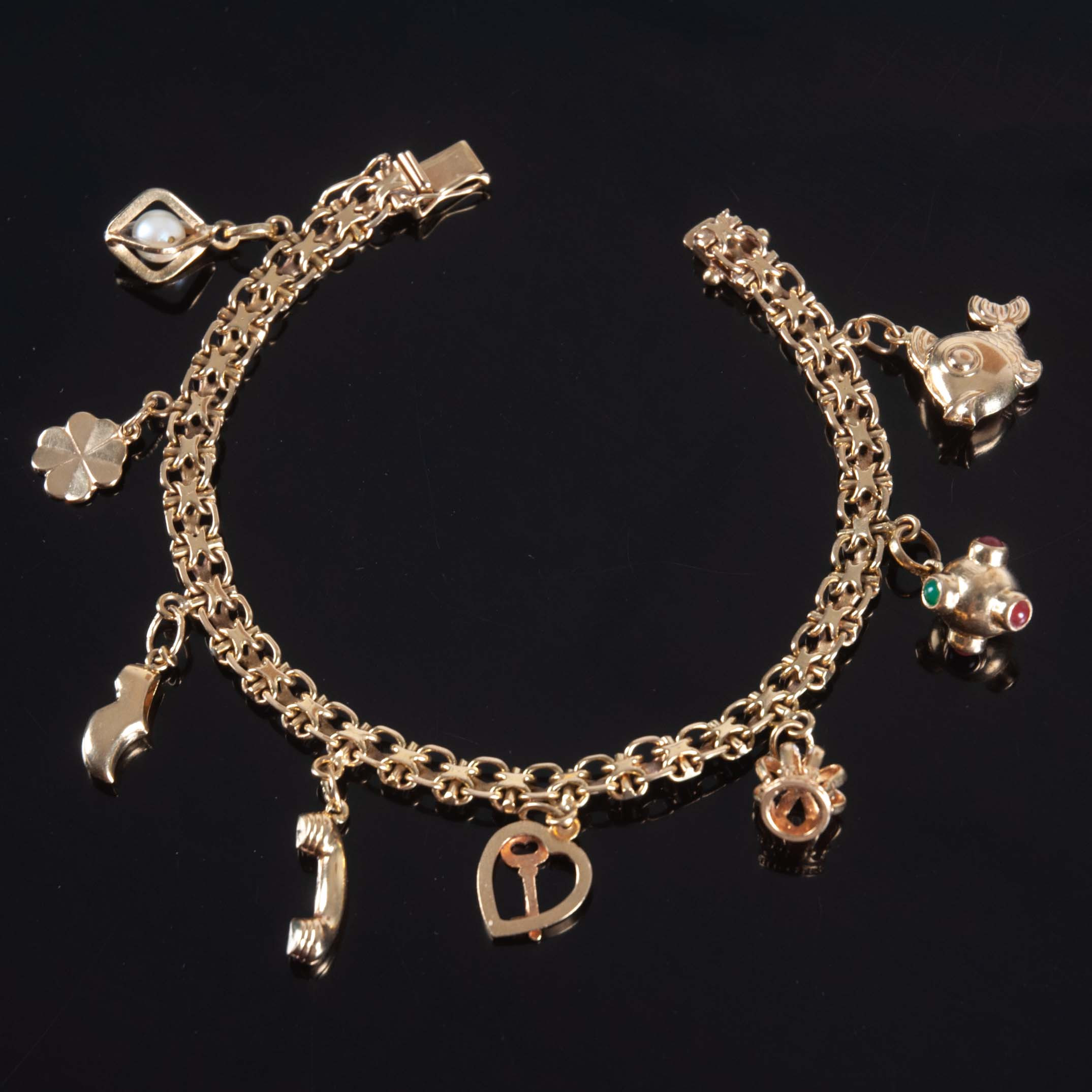 BERLOCKARMBAND 18 k guld 20,17 g.