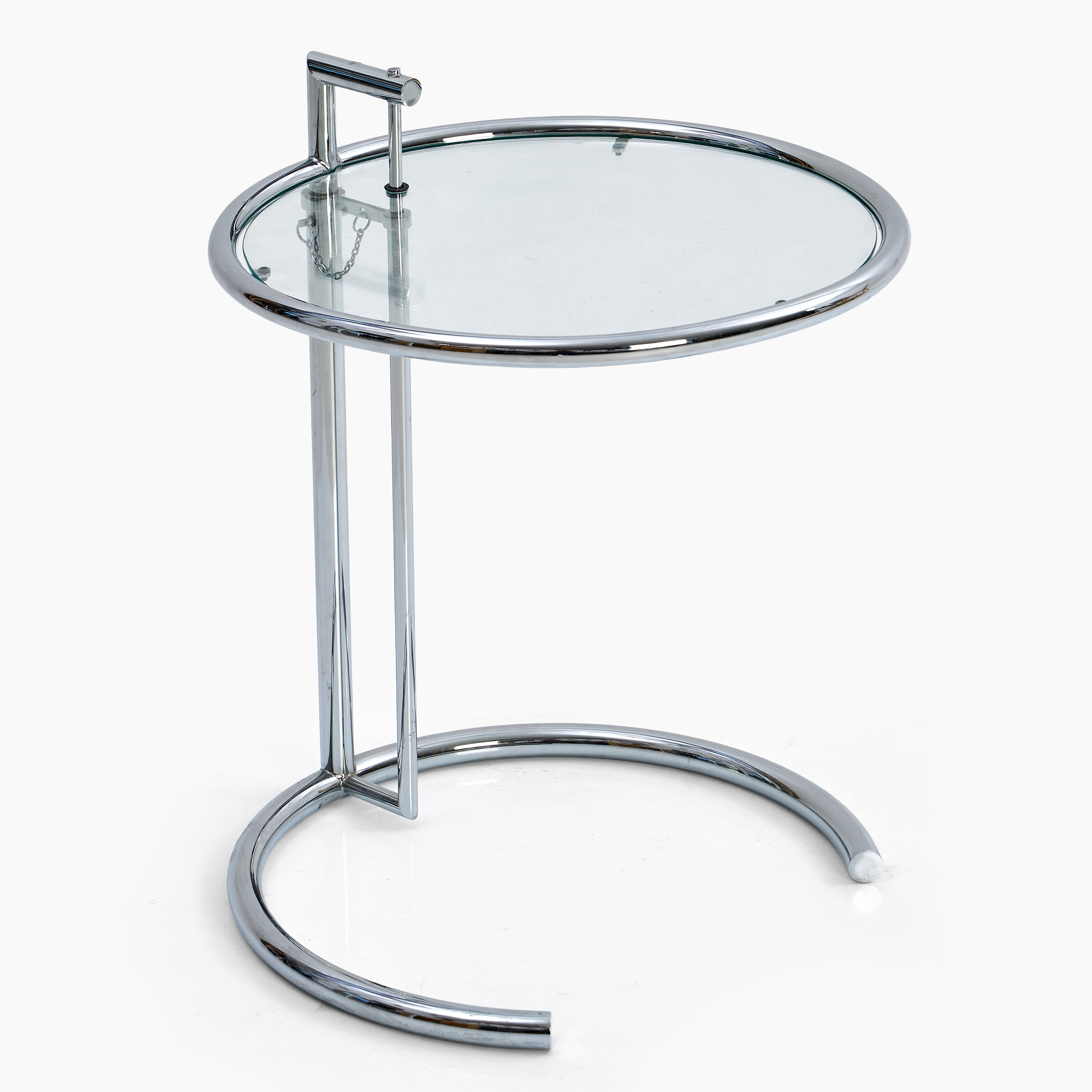 EILEEN GREY. Sidobord, modell E1027, ClassiCon, formgiven 1927, stomme i kromad metall, skiva i glas, justerbar höjd.