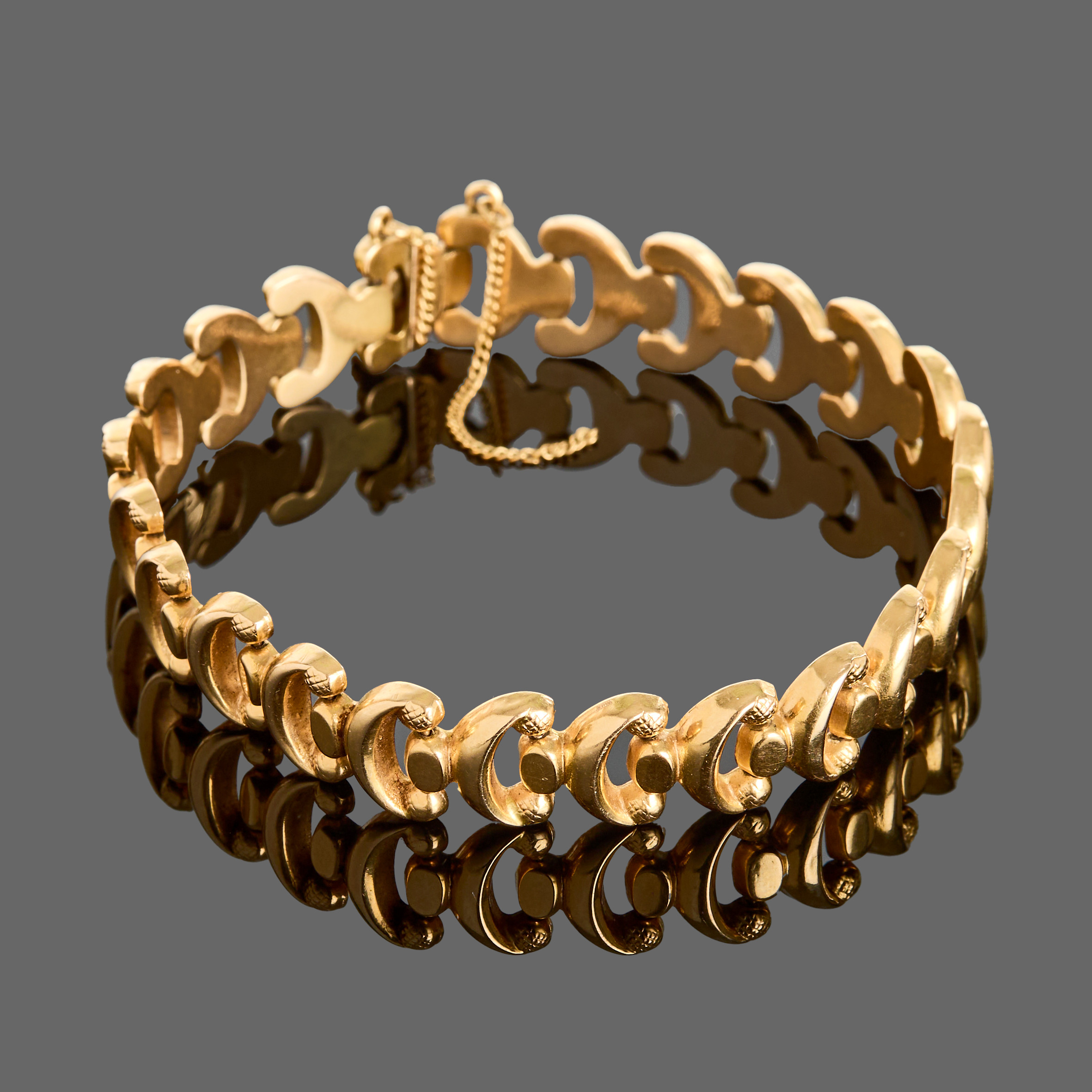 ARMBAND, 18k guld, fantasi-länk, genombruten dekor.