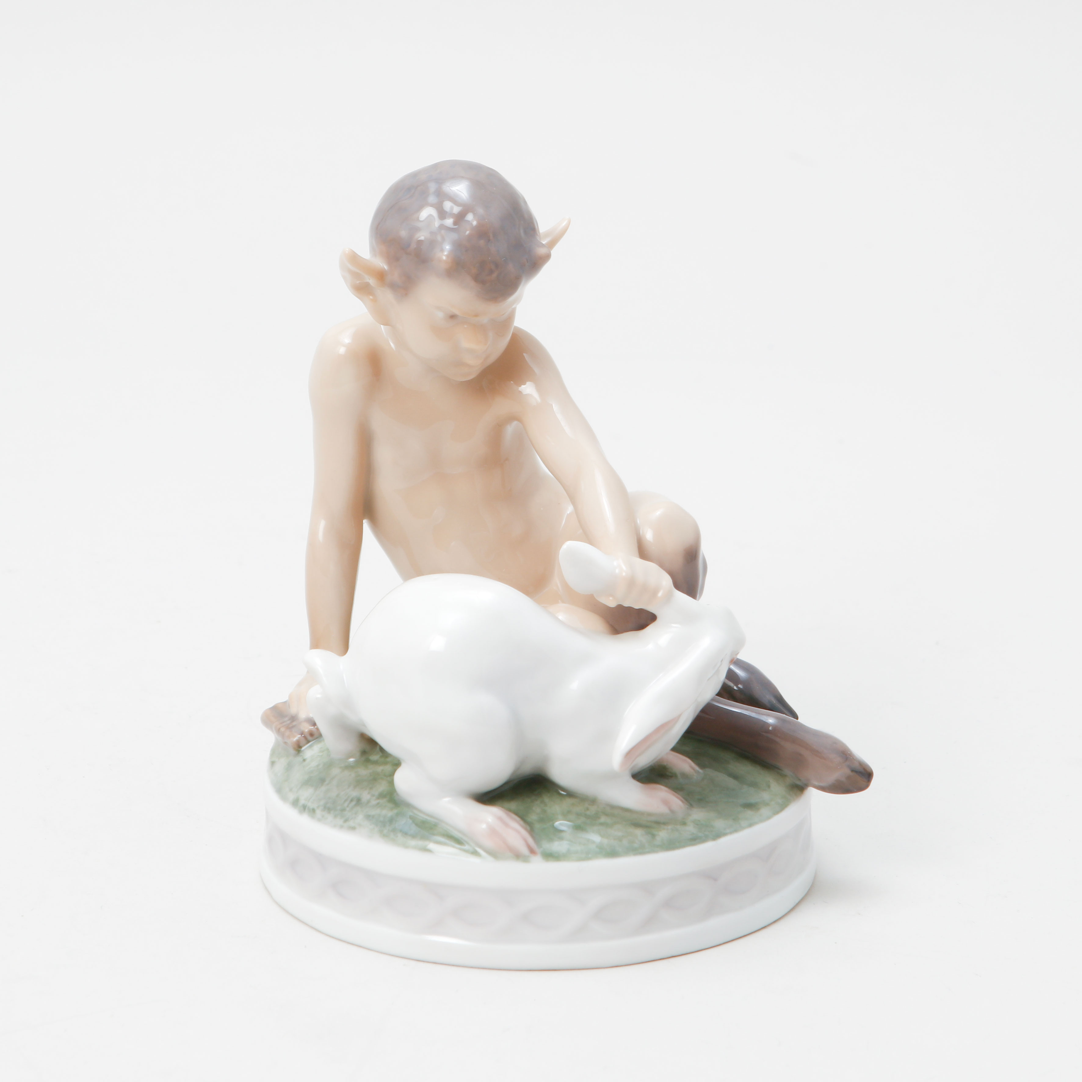 CHRISTIAN THOMSEN. Figurin, faun med kanin, porslin, Royal Copenhagen.
