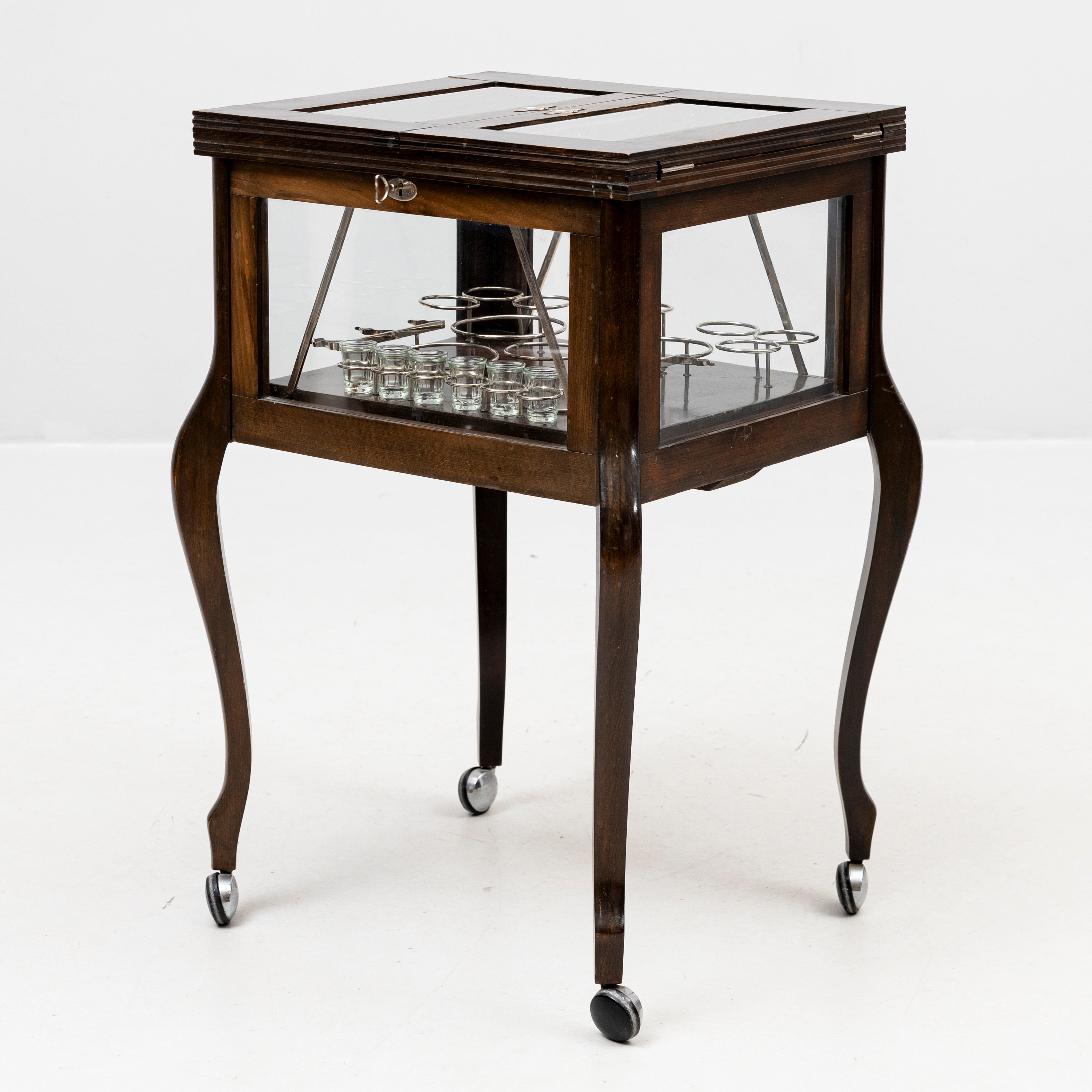 COCKTAILBORD, bonat trä samt glas med invändig uppfällbar inredning, omkring 1900-talets mitt.