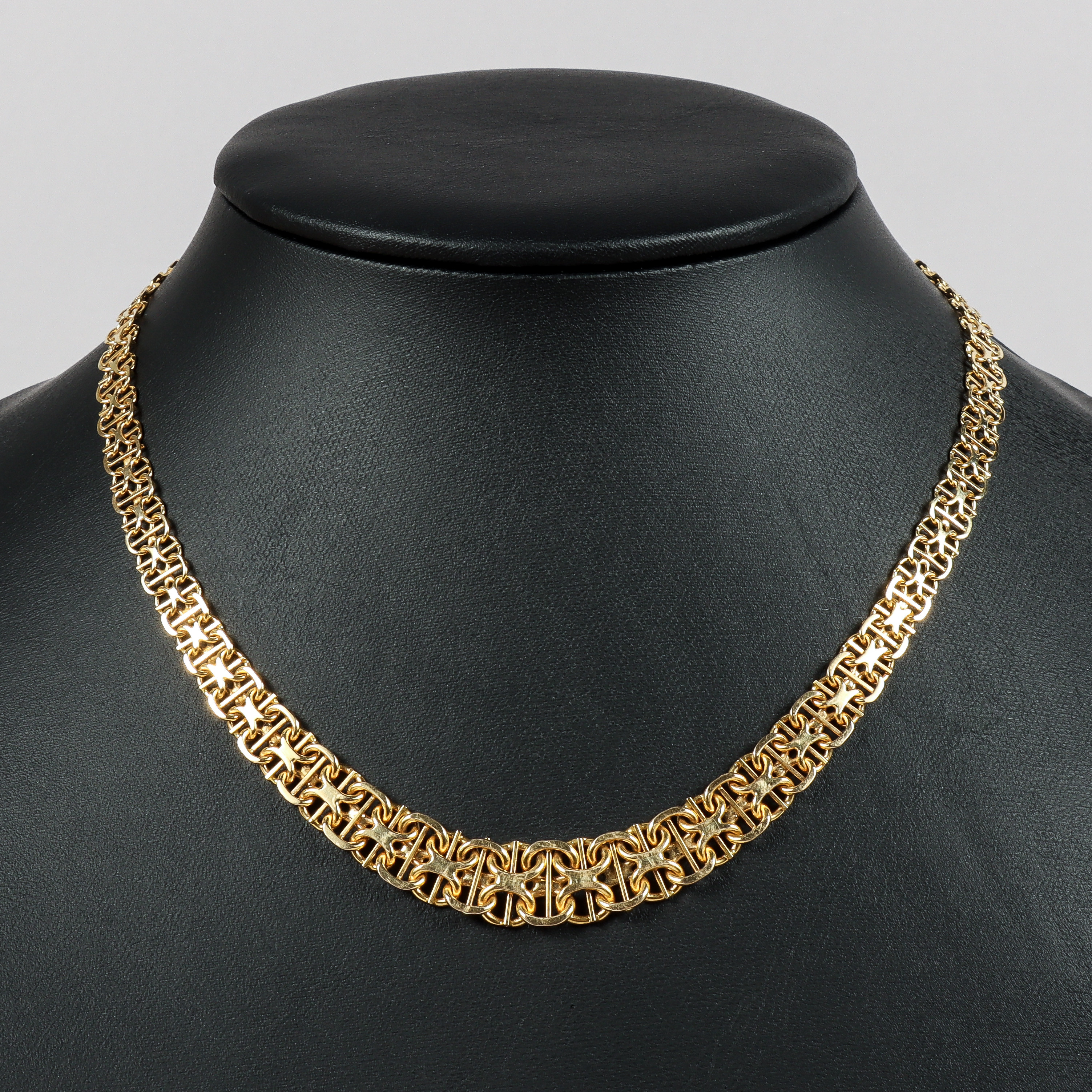 COLLIER, X-länk med stav, 18k guld, doserat.