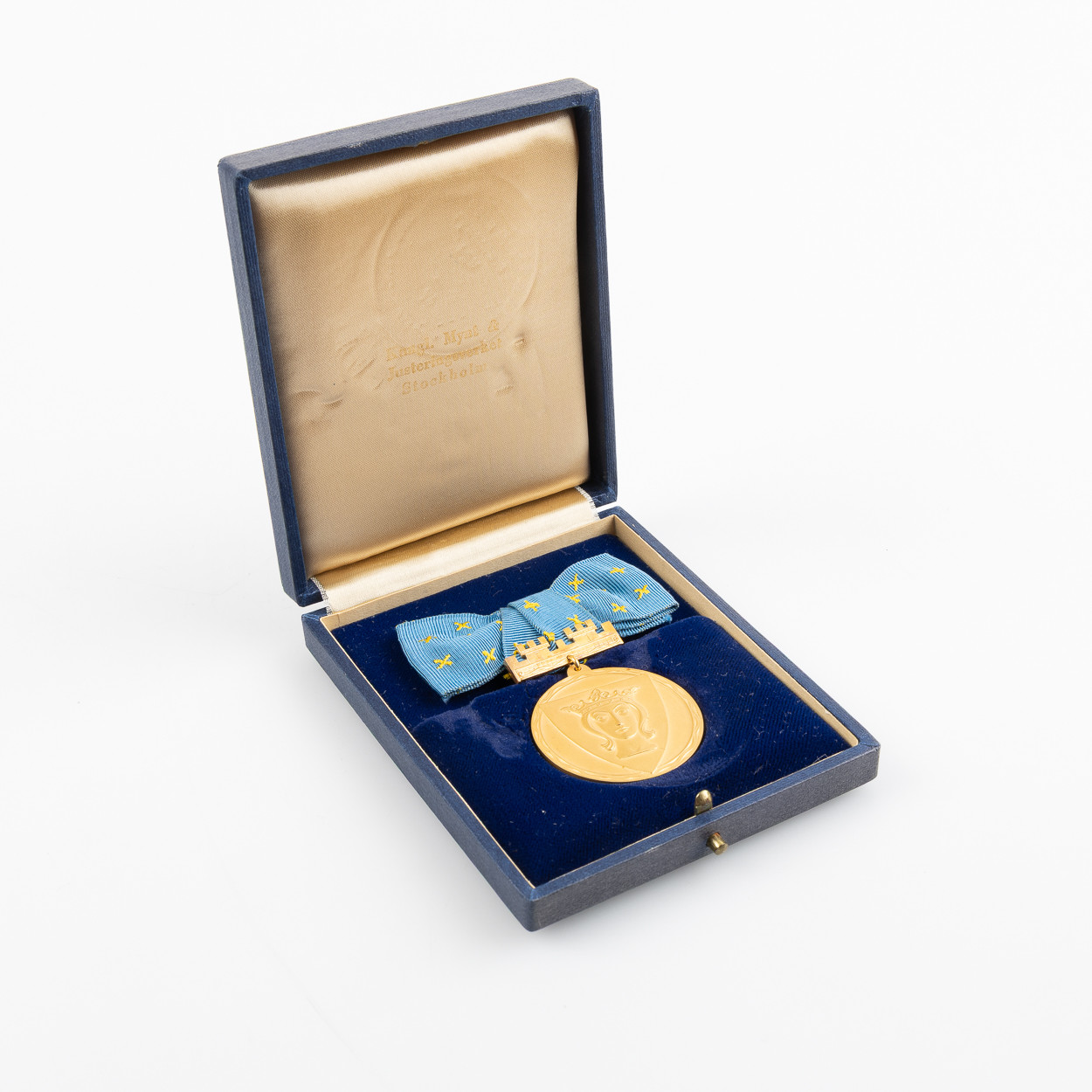 FÖRTJÄNSTMEDALJ, 21K samt 18K guld," För trohet och nit Stockholms stad", 1970.