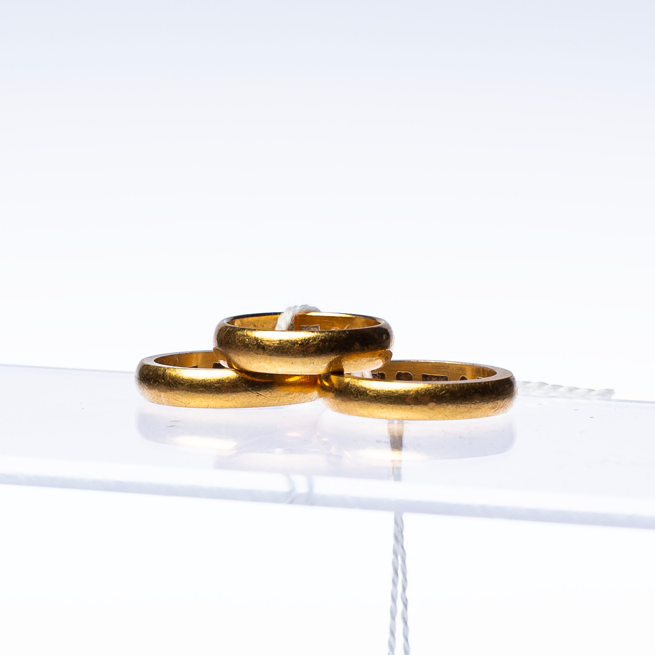 RINGAR, 3 st 23 k guld, ca 25.09 g.