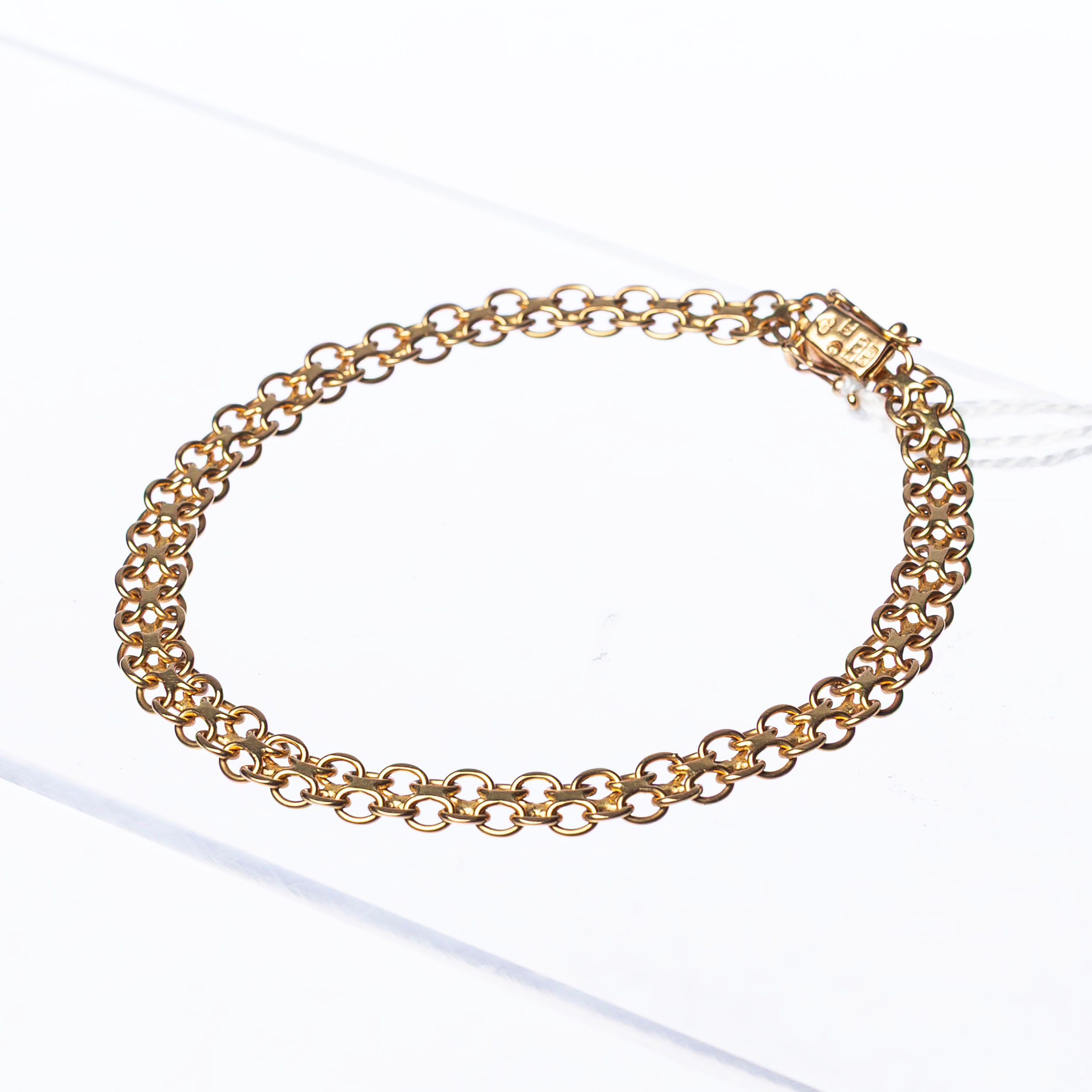 ARMBAND, X-länk, 18 k guld.