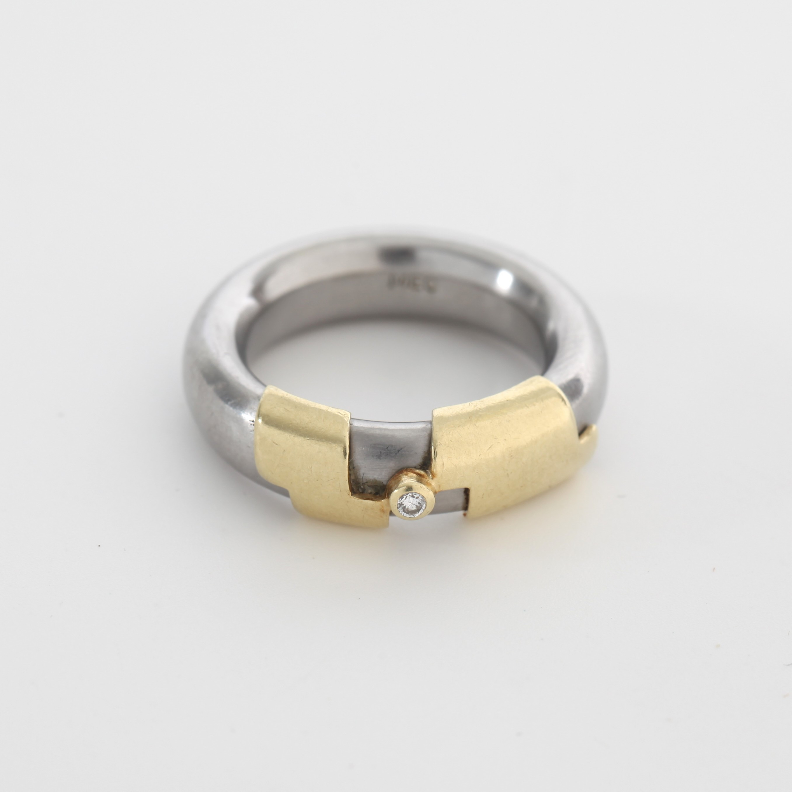 TITANRING MED BRILJANT OCH 14K GULD, 19/2000-tal.