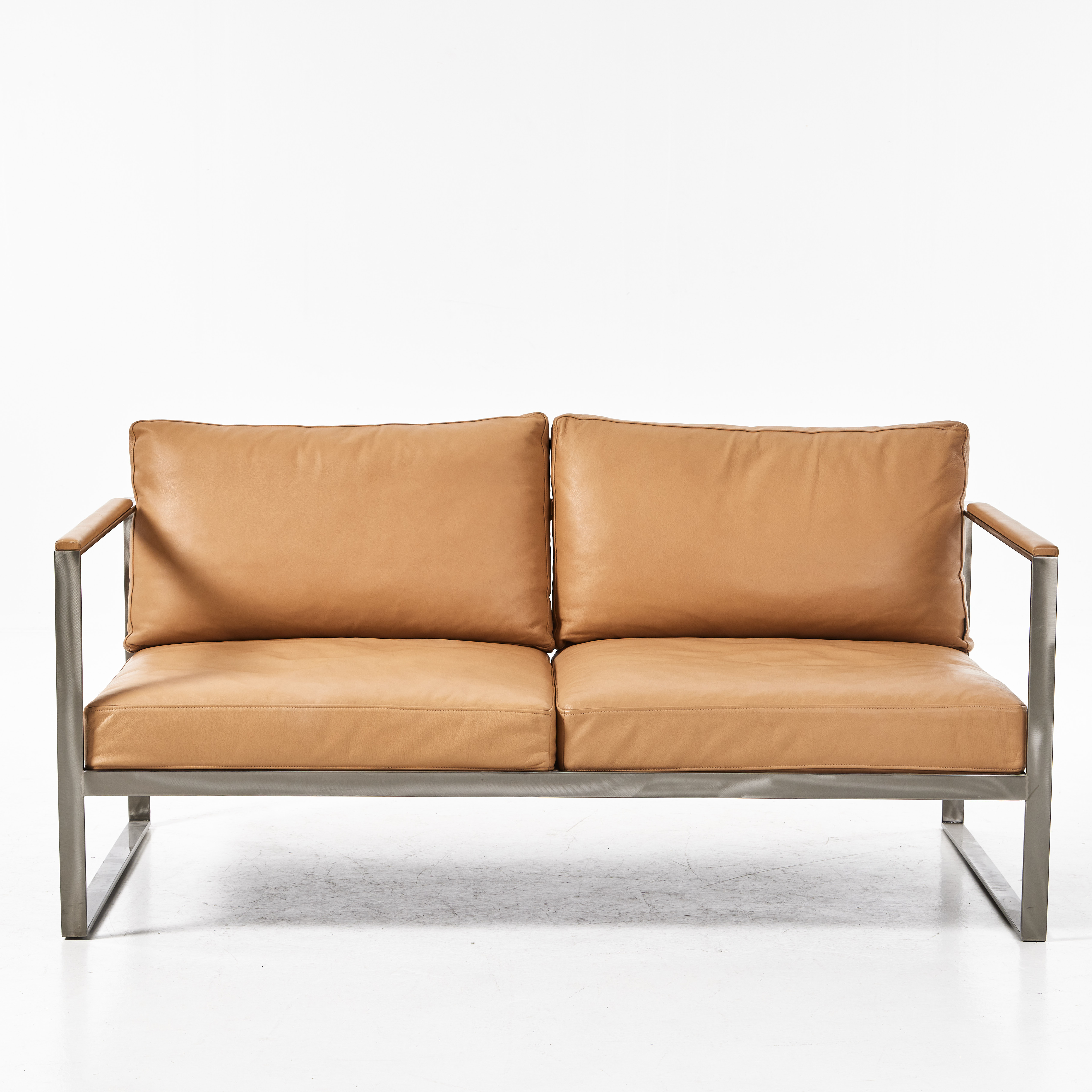 BROBERG & RIDDERSTRÅLE, "Monaco Lounge Sofa", 2-sits, Röshults, 2000-tal. stomme i stål och lösa skinnklädda plymåer.