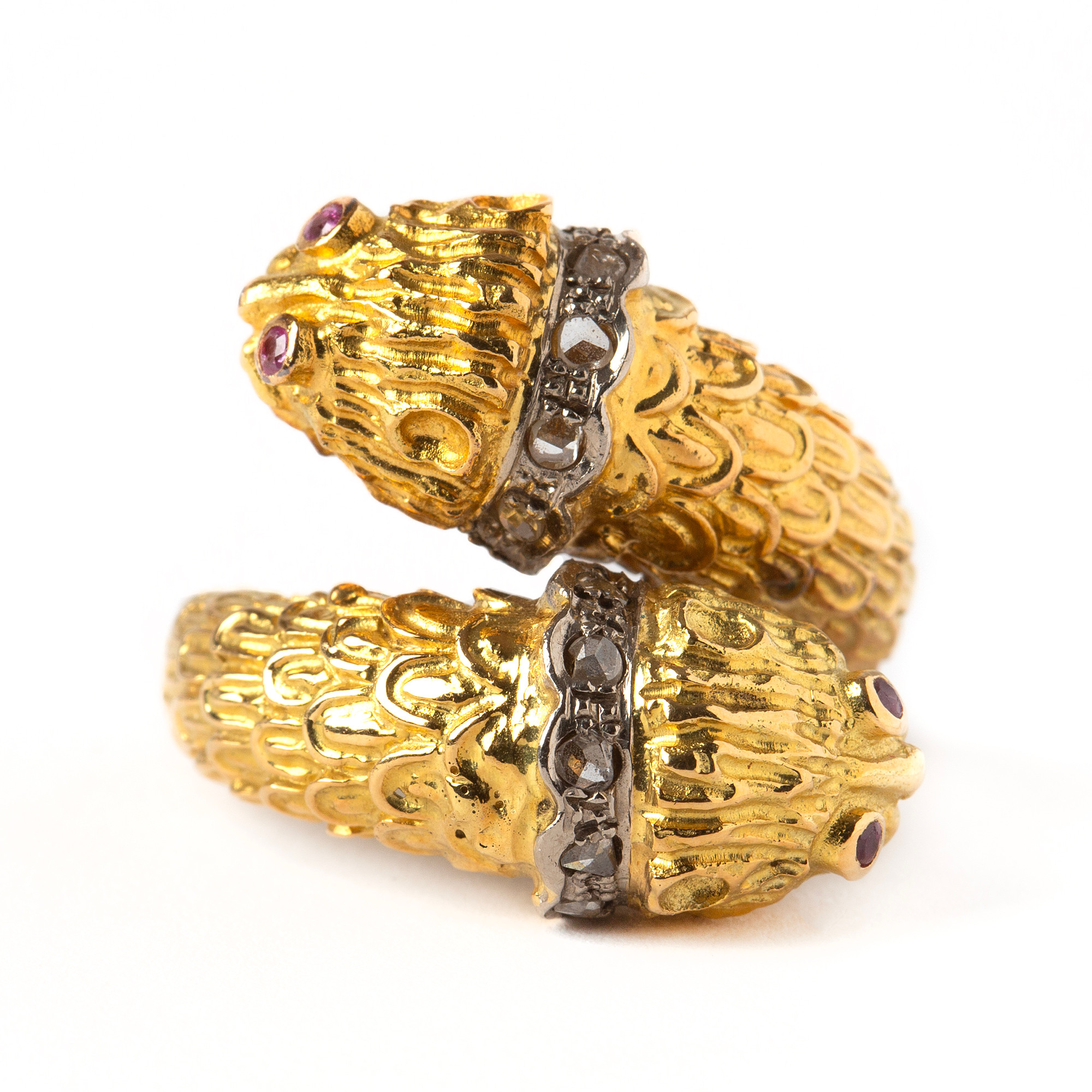 RING, 18K guld och vitguld med rosenslipade diamanter och fasettslipade rubiner.