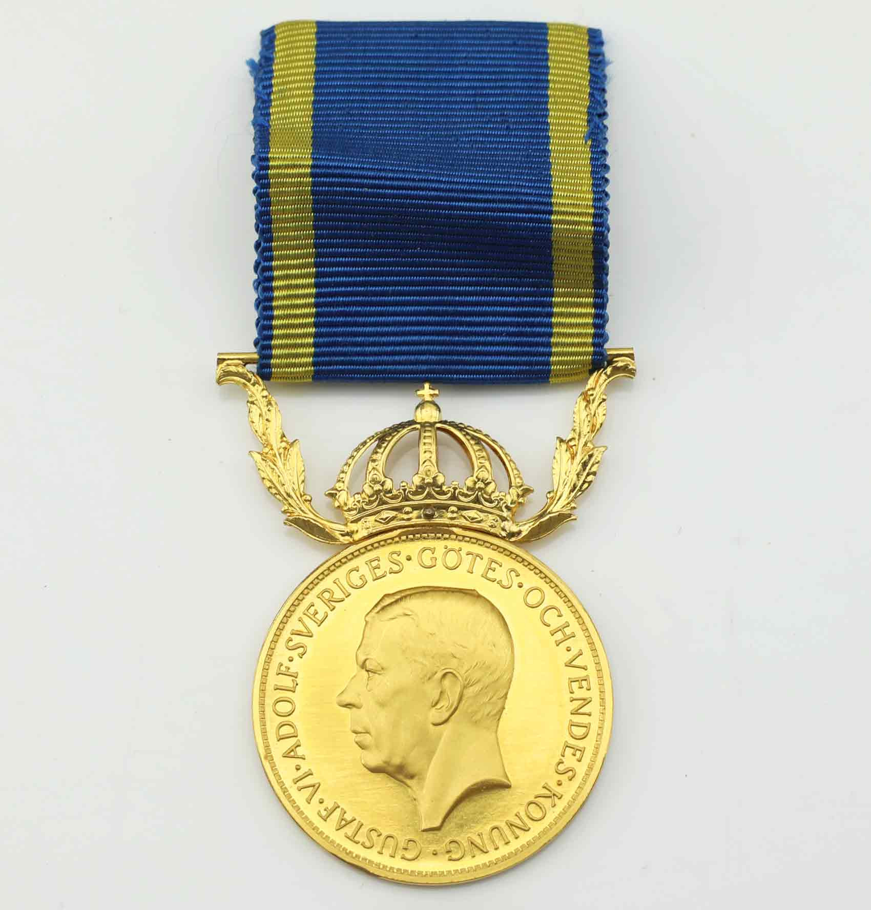 FÖRTJÄNSTMEDALJ, 23K/18K guld, För nit och redlighet i rikets tjäns.