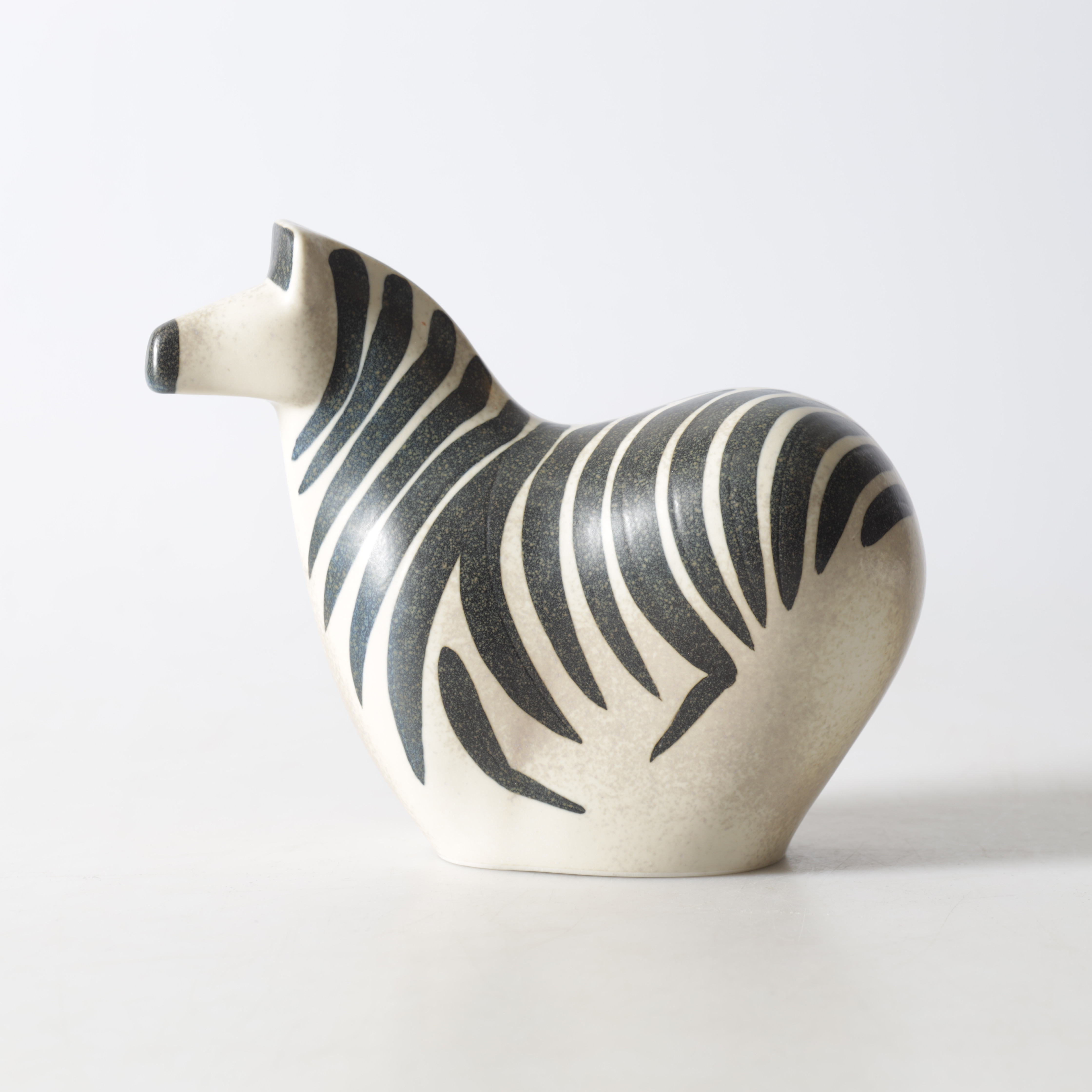 LILLEMOR MANNERHEIM. Figurin, glaserat stengods, Arabia, signerad och daterad -84.