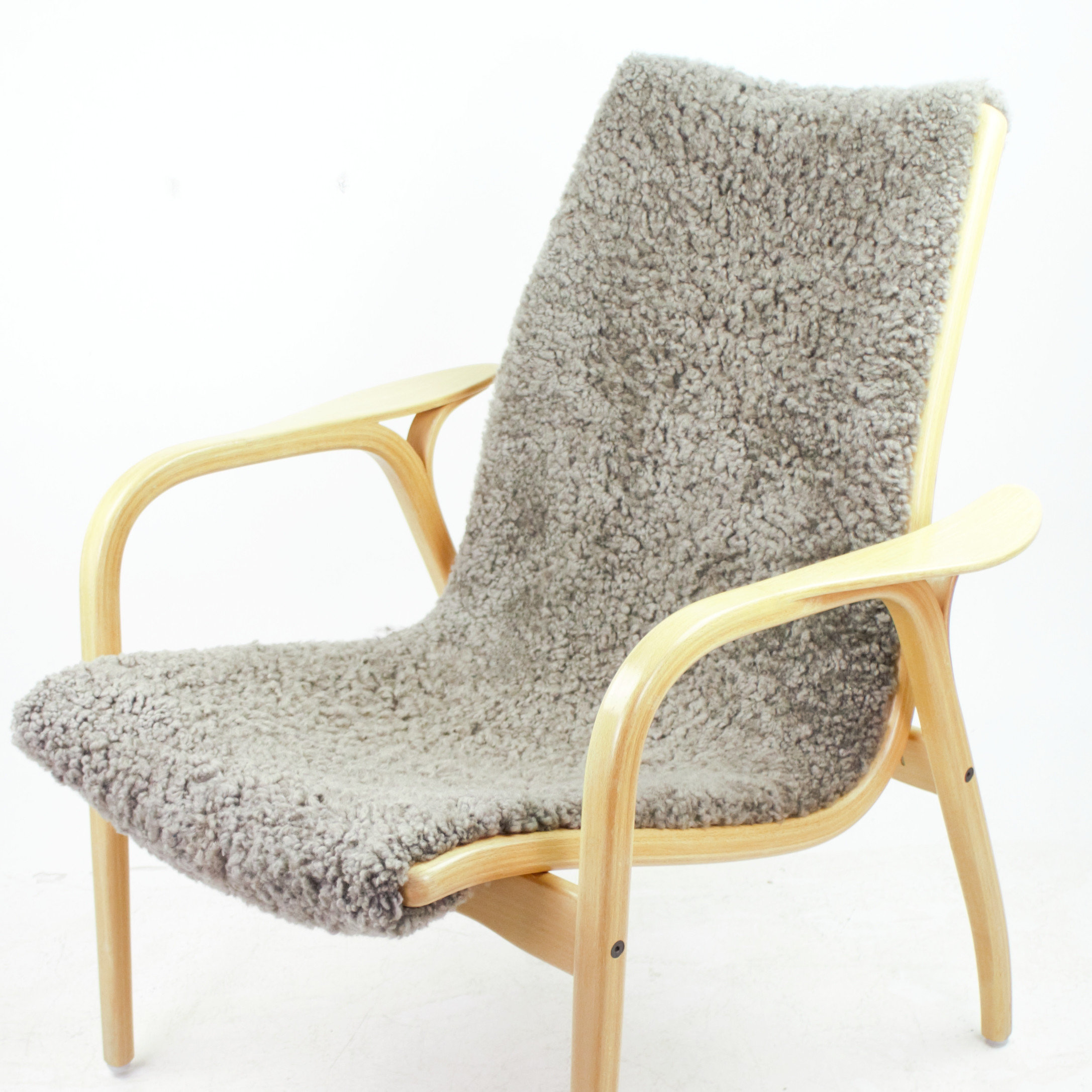 YNGVE EKSTRÖM. Fåtölj, "Laminett", bärväv av canvas, stomme av bok, grå fårskinnsklädsel, brännmärkt Swedese.