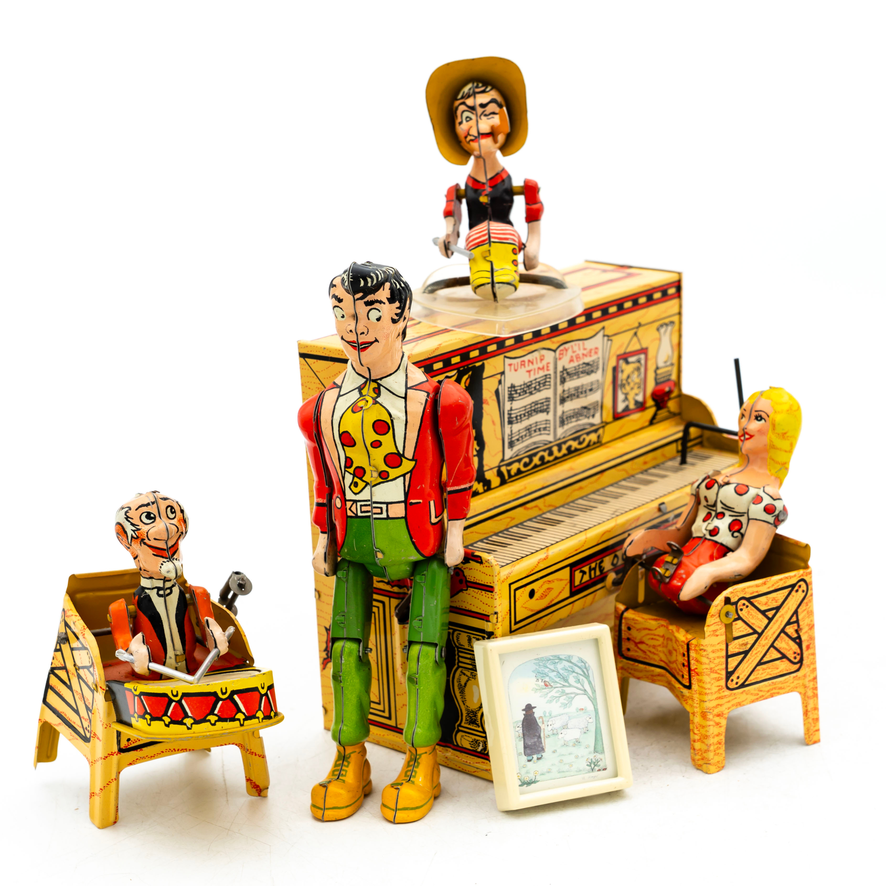 "THE DOGPATCH BAND", Mekanisk plåtleksak, Unique Art Manufacturing Co Inc, Made in USA, 1945. (5delar).