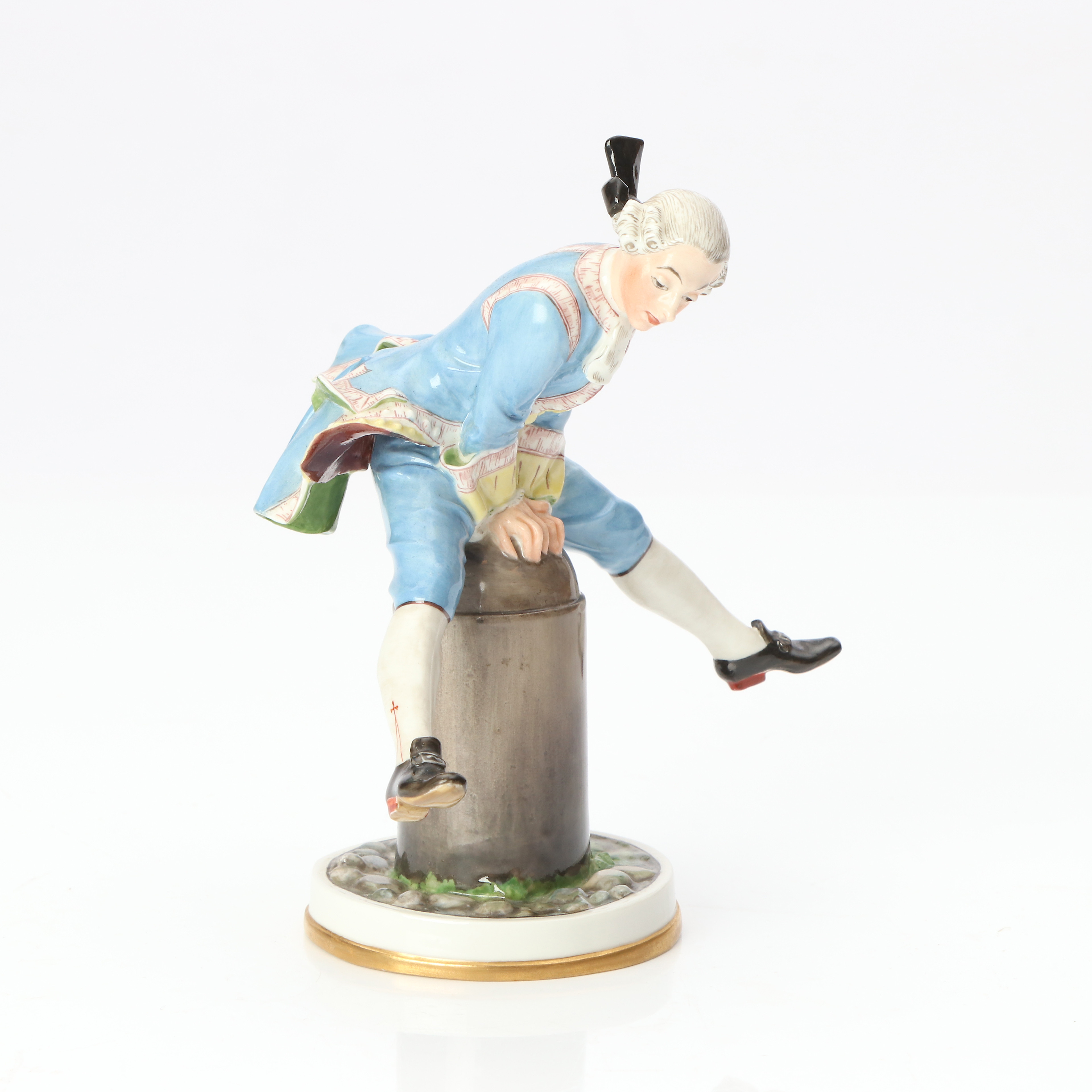 BING & GRÖNDAHL, FIGURIIN. Porslin med polykrom dekor. Man som hoppar bock. 1900-talets första hälft.