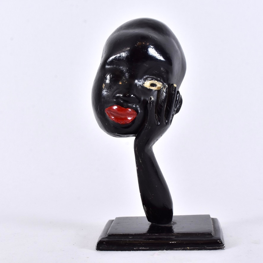 KARL HAGENAUER. HANS ART. skulptur, bemålad metall, afrikanskt ansikte och hand.