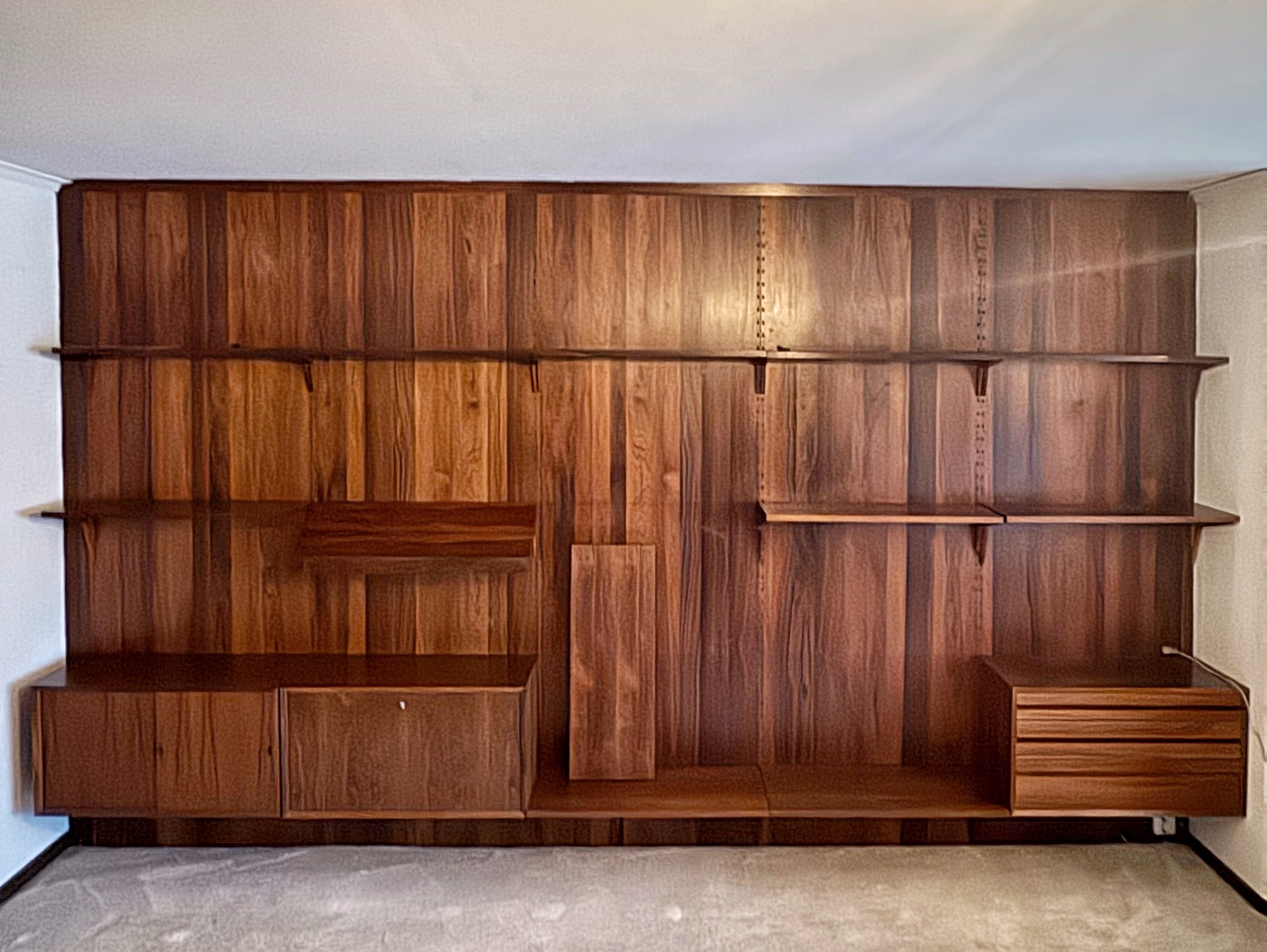 POUL CADOVIUS. Hyllsystem, 23 delar, riopalisander, "Cado", Danmark 1960-tal.