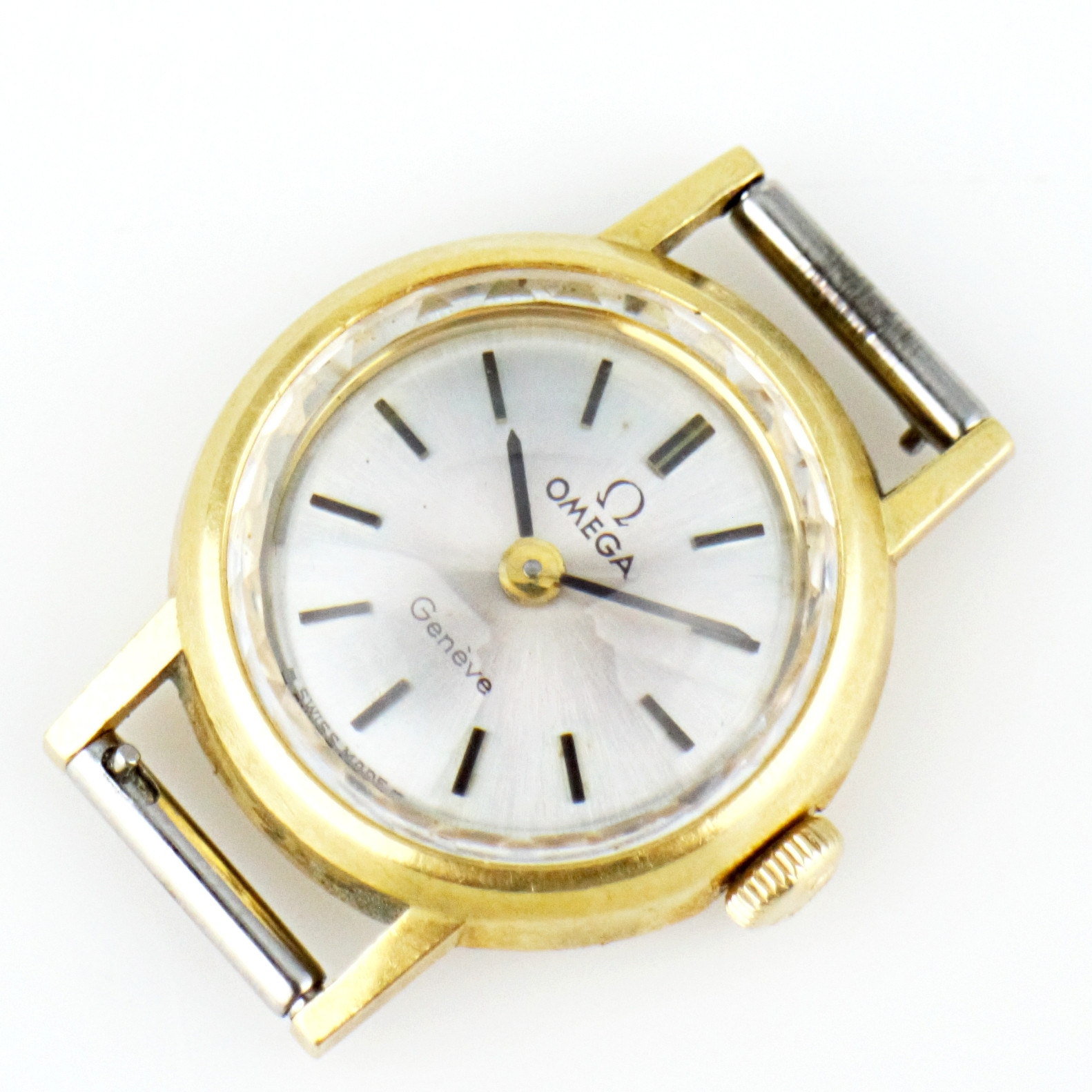 OMEGA. Genève, armbandsur, dam, guld 18k, manuell, saknar armband, Schweiz.