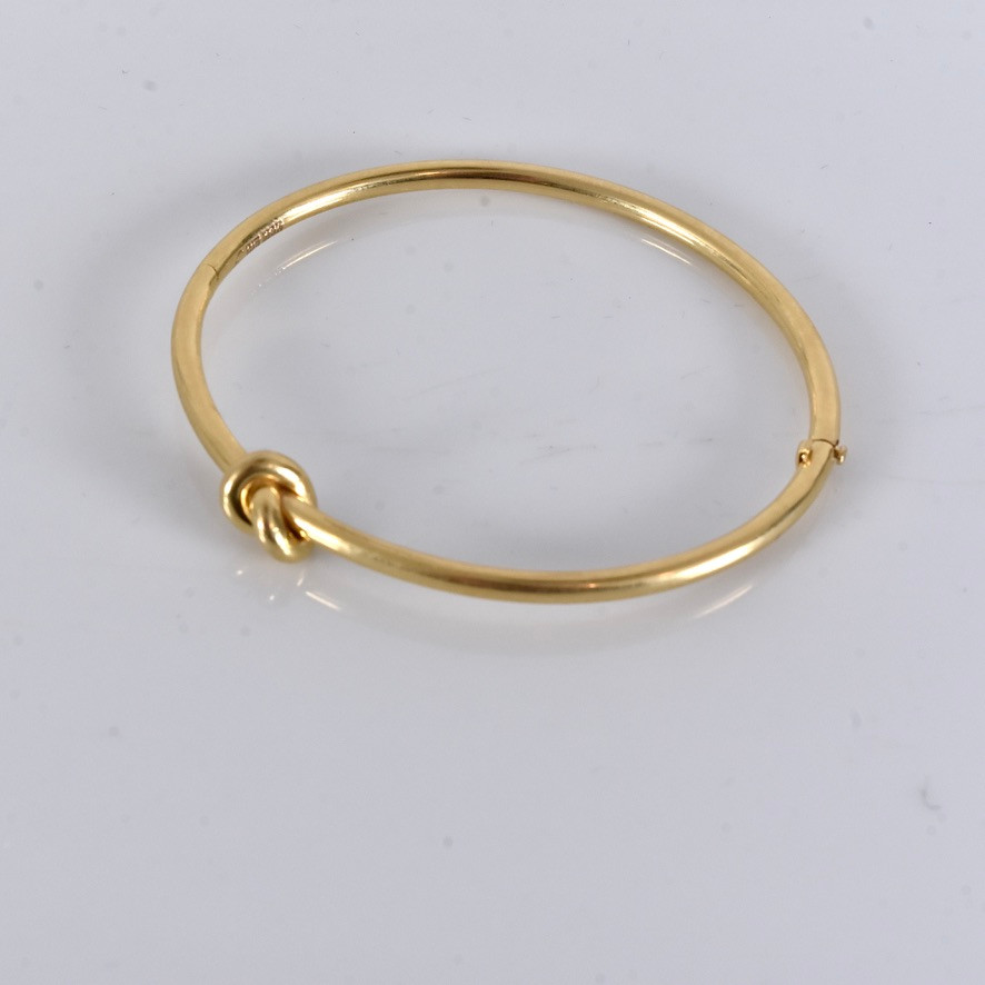 STIG ENGELBERT. armband, 18 karat rödguld, "Legacy Knot Bangle".