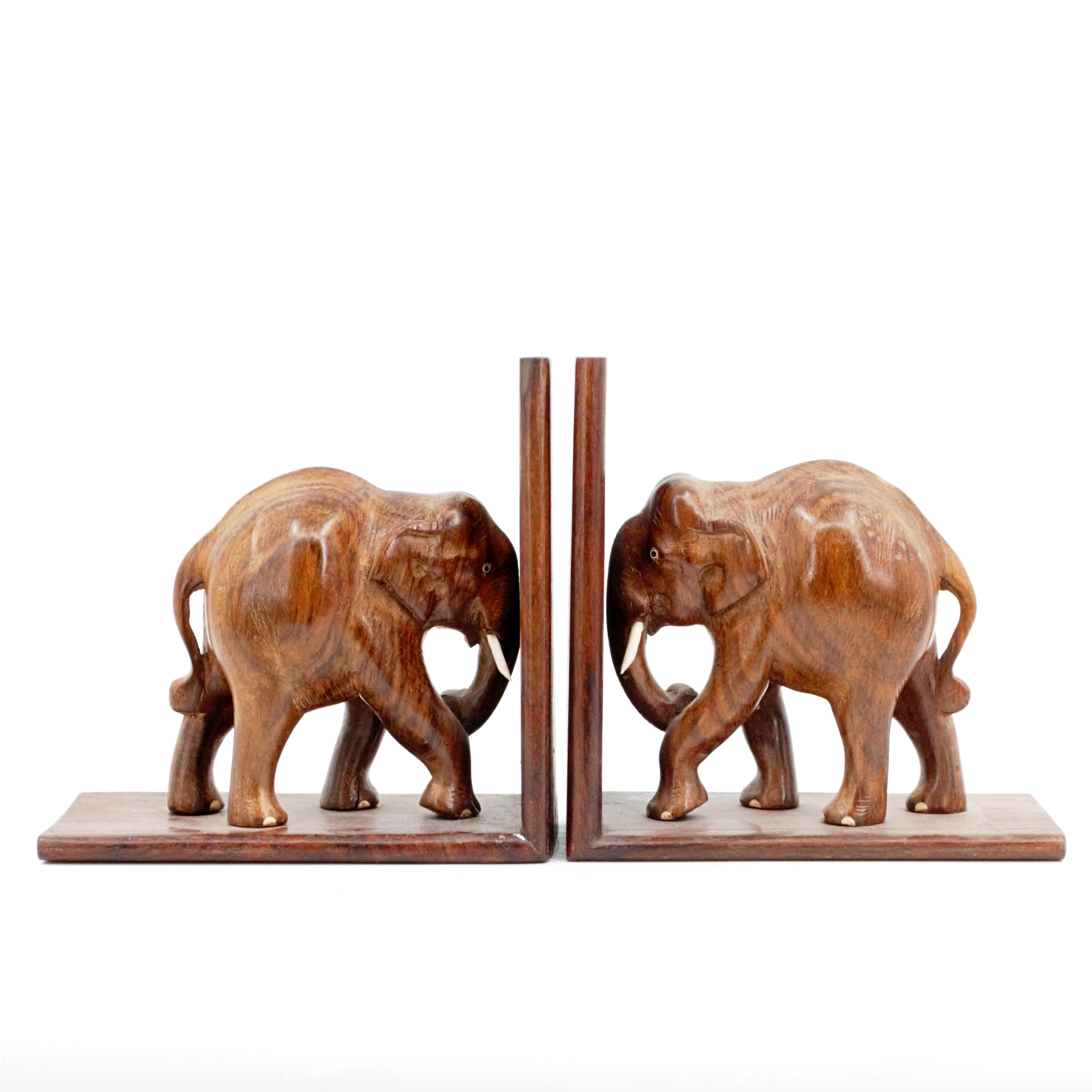 BOKSTÖD, ett par, snidat trä i form av elefanter, Asien.