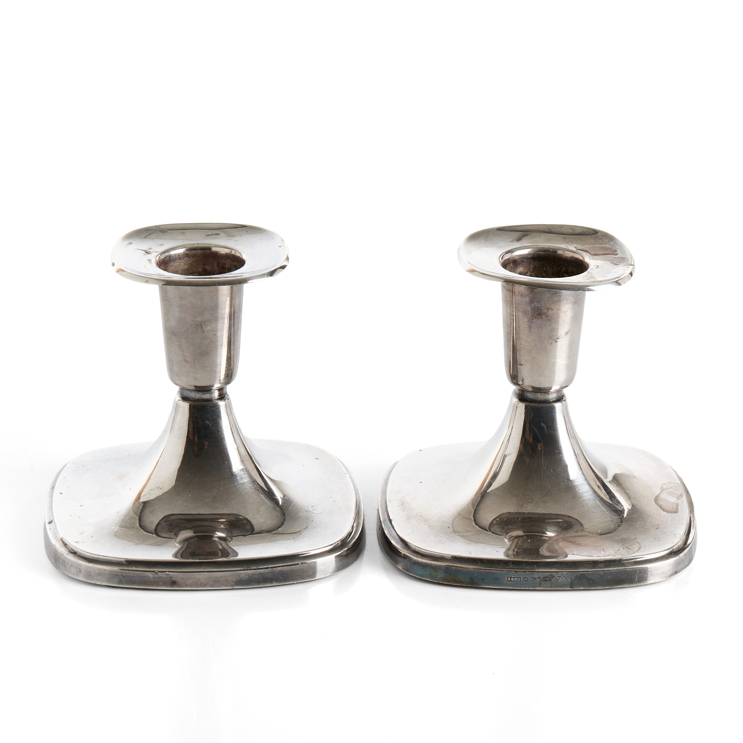 LJUSSTAKAR i silver, ett par, Tore Eldh, 1965, silver. (fyllda i botten).