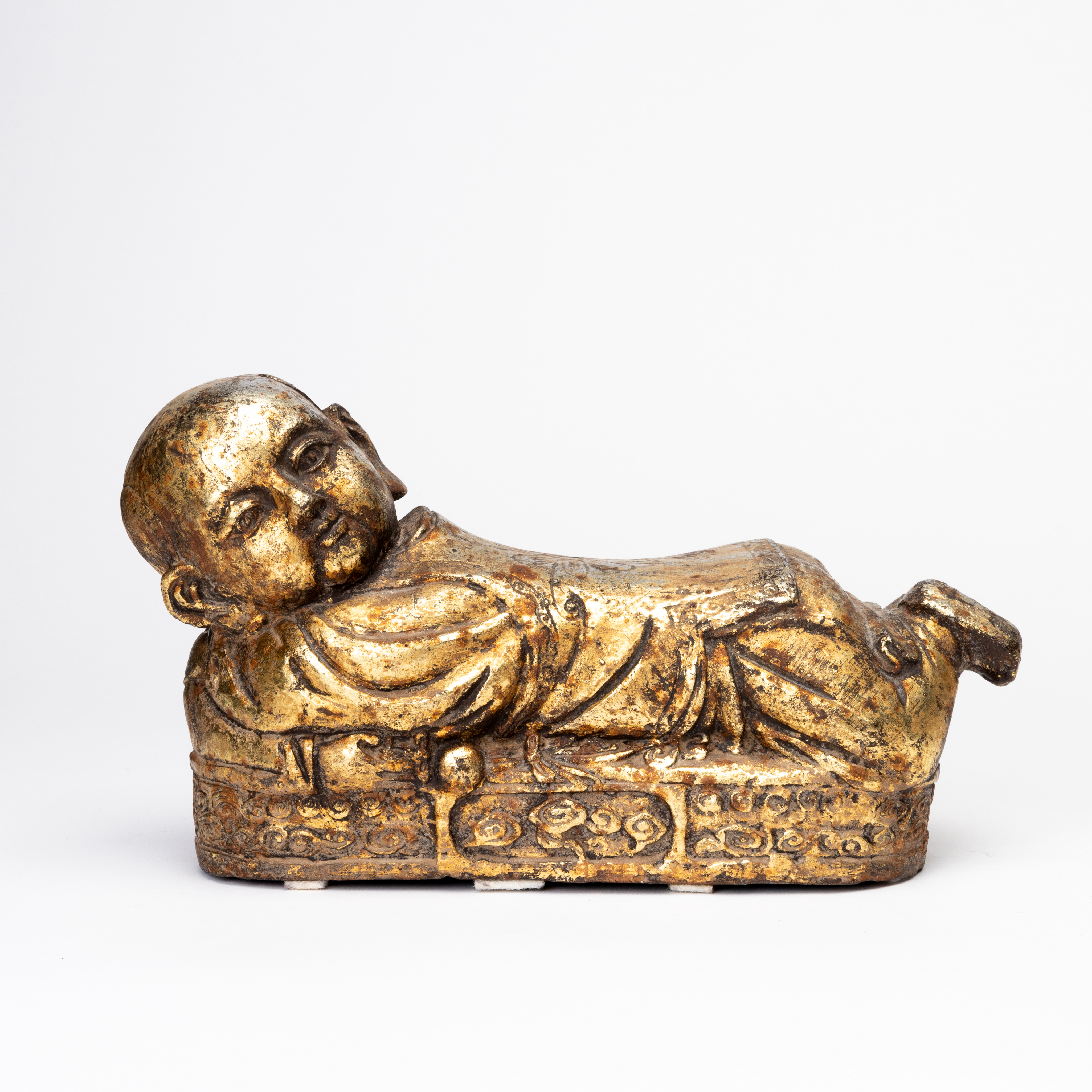 OPIUMKUDDE, patinerad metall, Kina, 1900-tal.