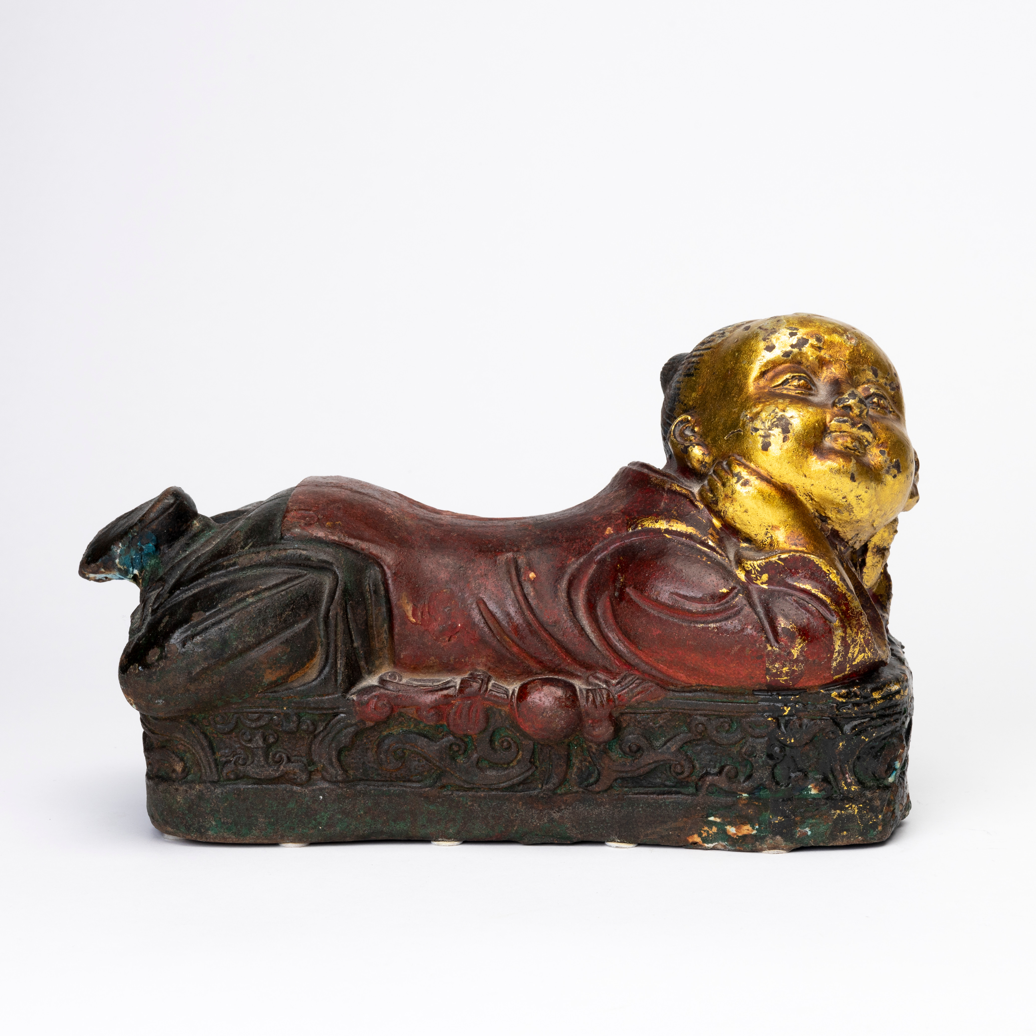 OPIUMKUDDE, patinerad metall, Kina, 1900-tal.