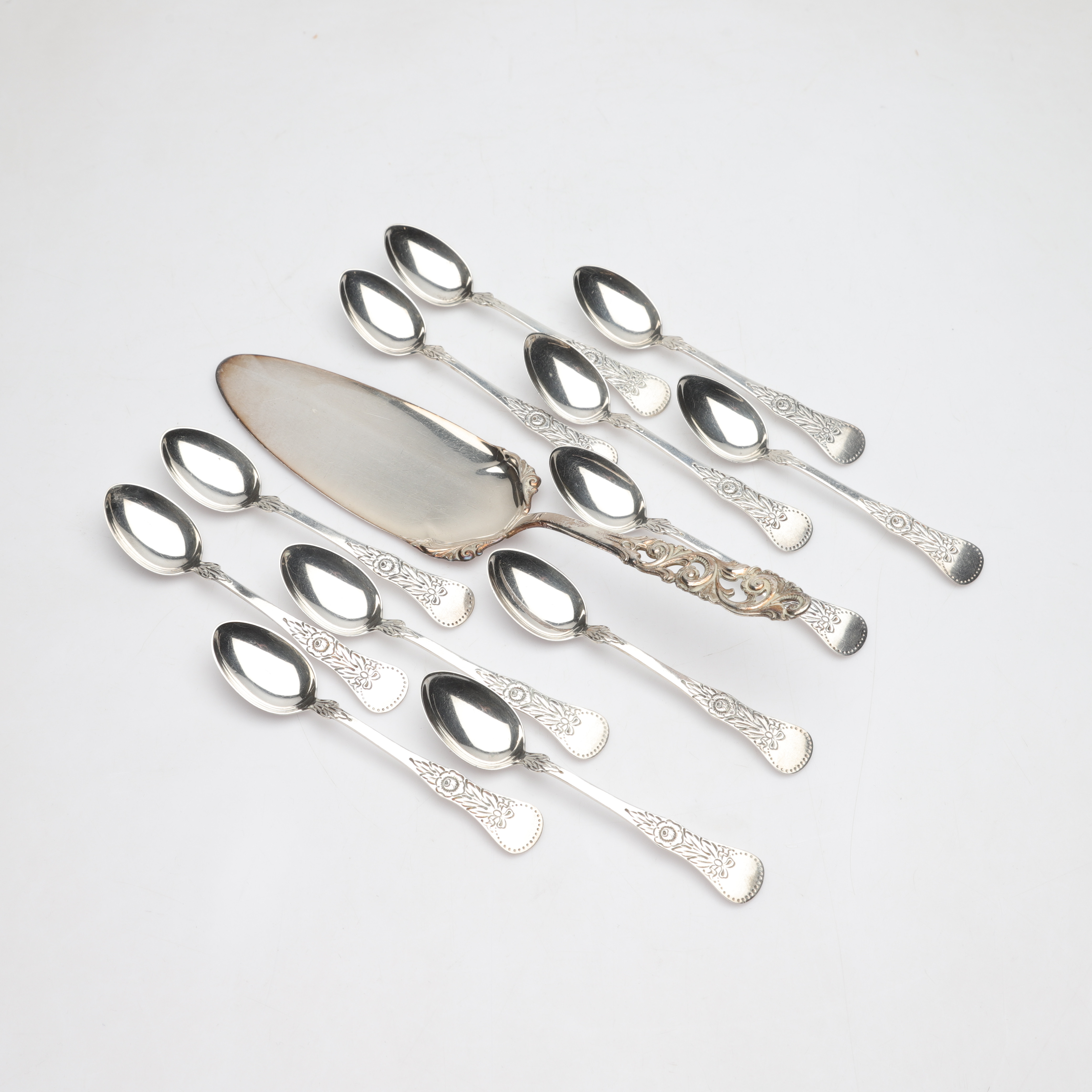 KAFFESKEDAR OCH TÅRTSPADE, 12+1 delar, silver, bland annat Jacob Tostrup, totalvikt ca 196,8g.