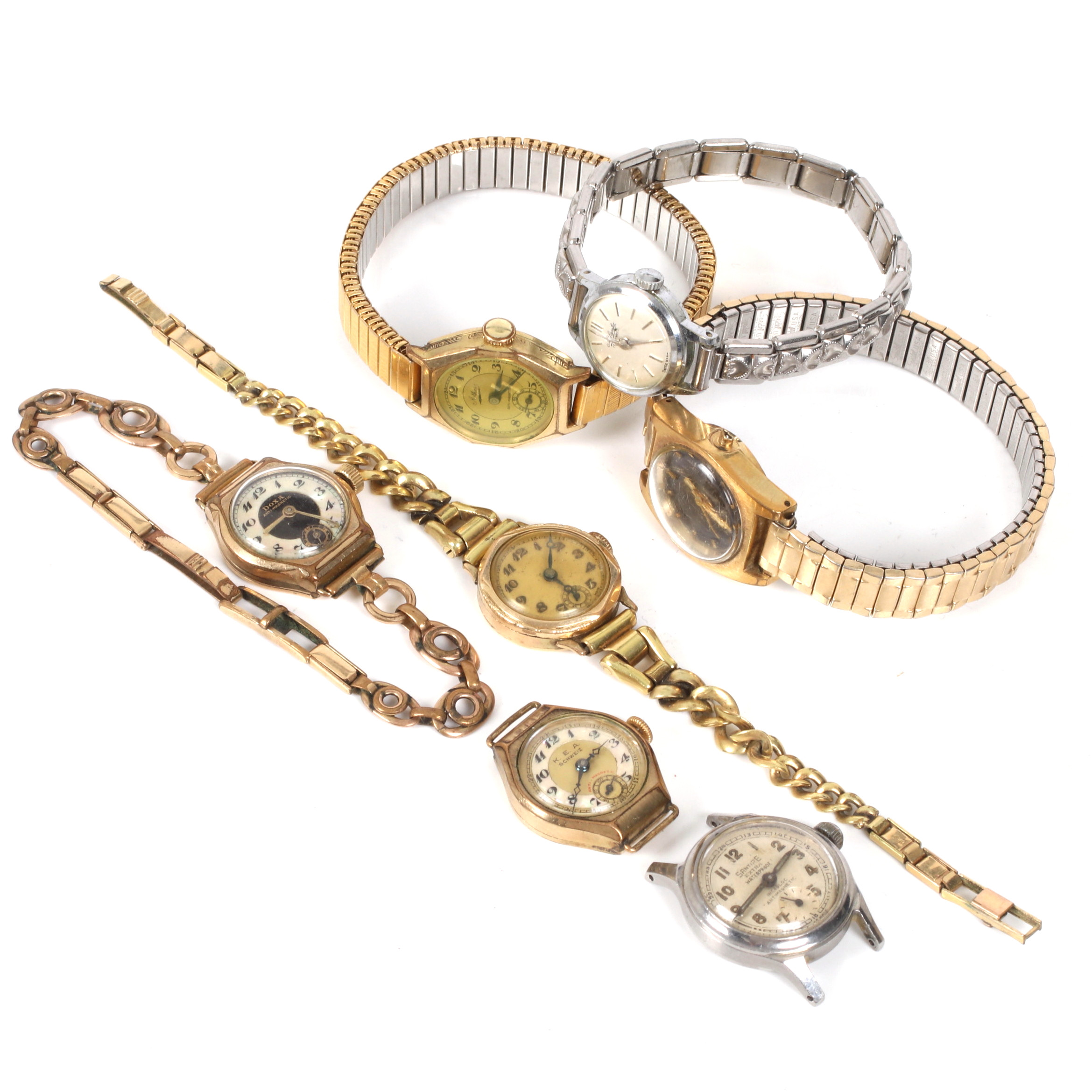 ARMBANDSUR, vit och gulmetall, bl.a. Doxa, Atlantic och Santire. 1900-tal.