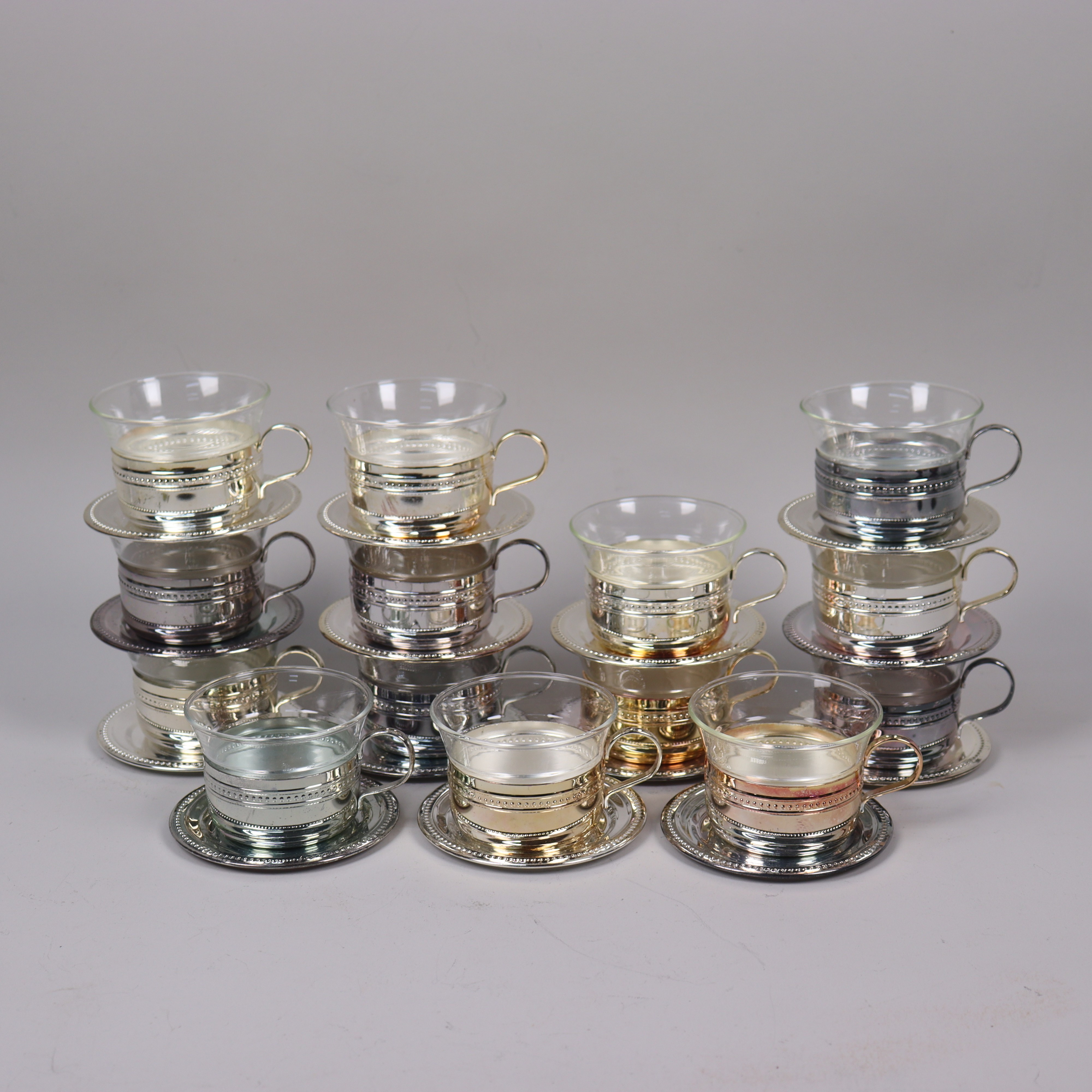 KAFFEKOPPAR, metall och glas, 28 delar.