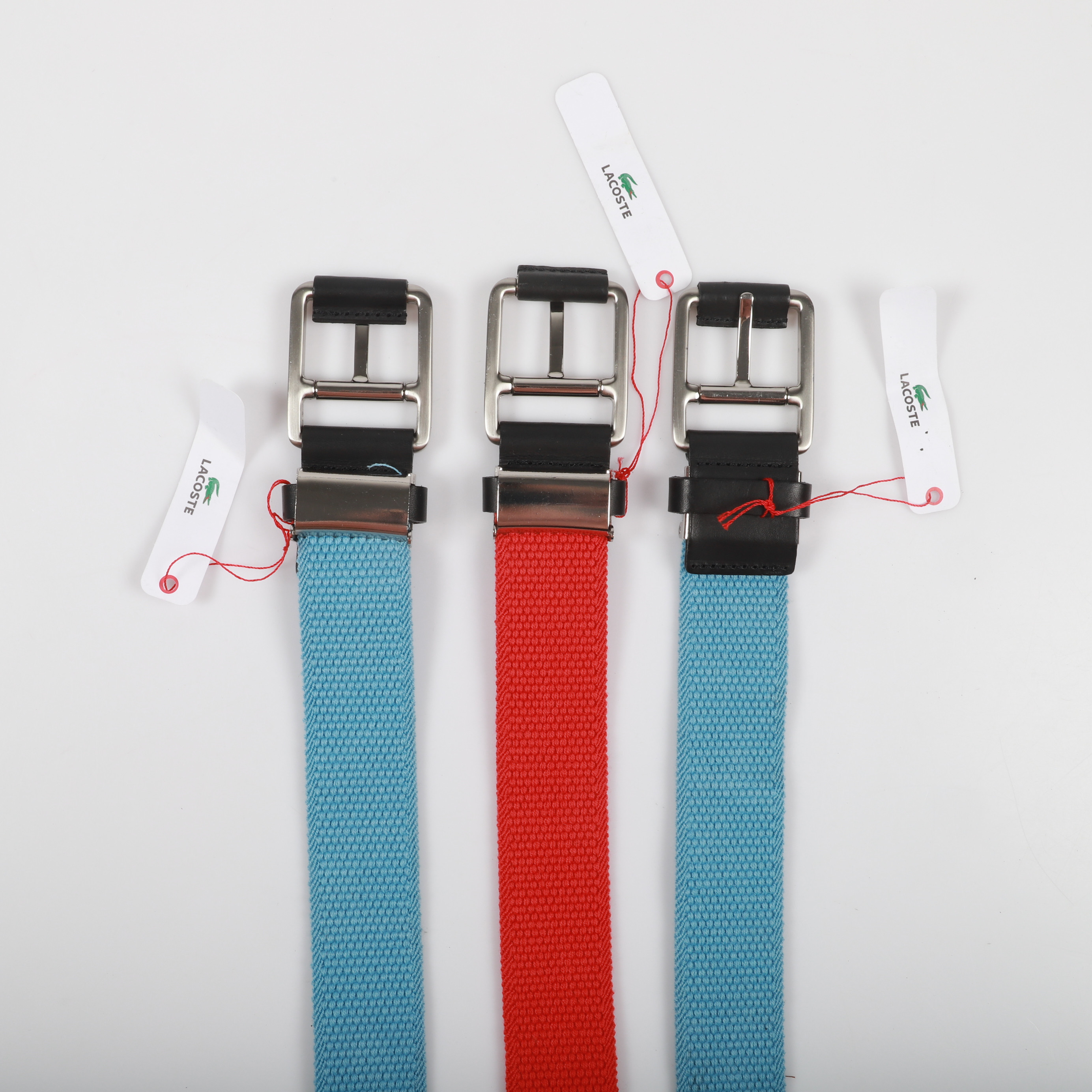 BÄLTEN, 3 stycken, textil med läderdetaljer, Lacoste.