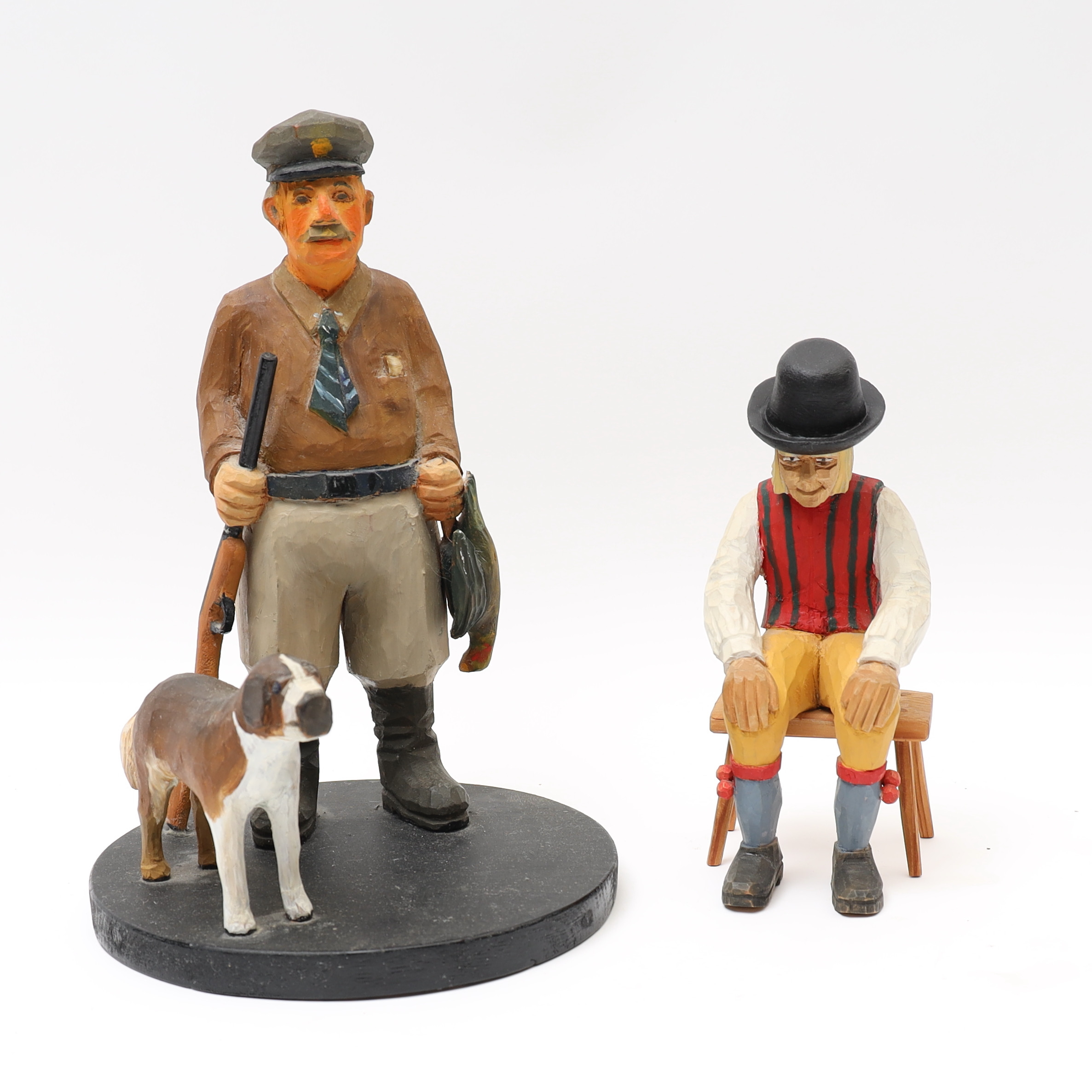 TRÄFIGURER, 2 Stycken, Signerade Oscar Eriksson och G Daniels.