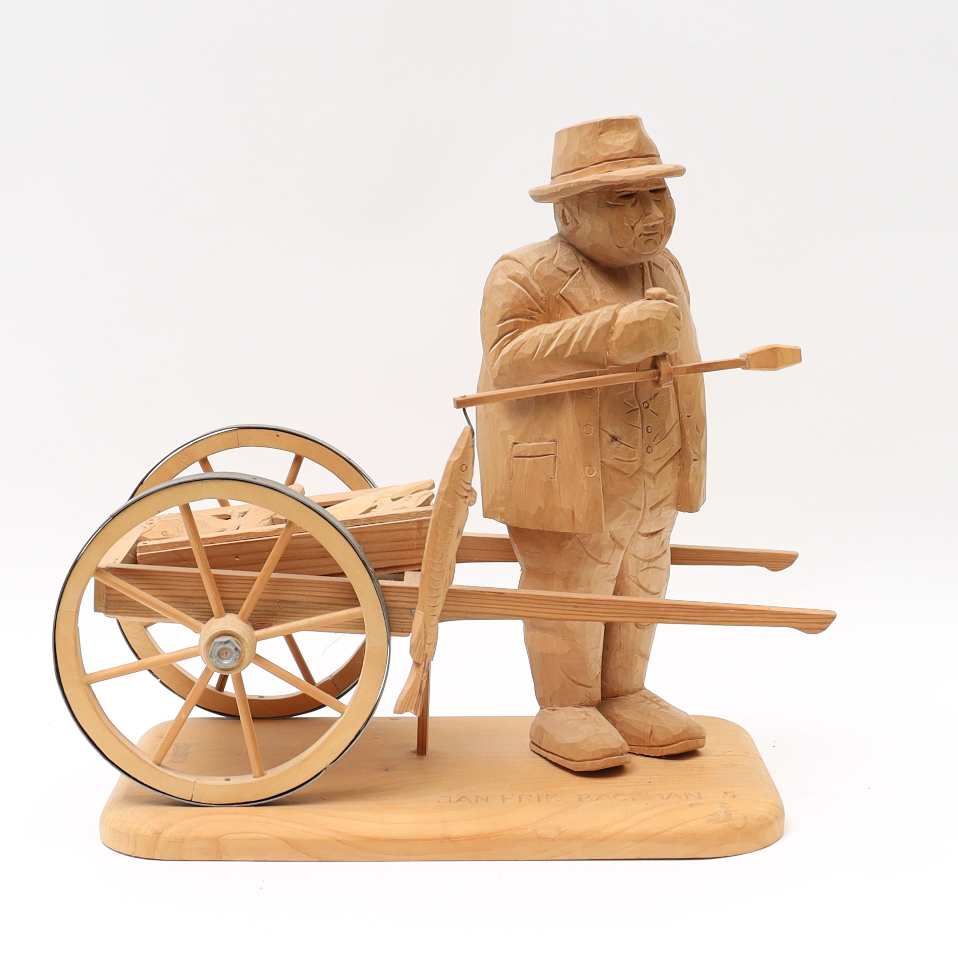 TRÄFIGUR, föreställande Jan Erik Backman, monogramsignerad TL 1997.