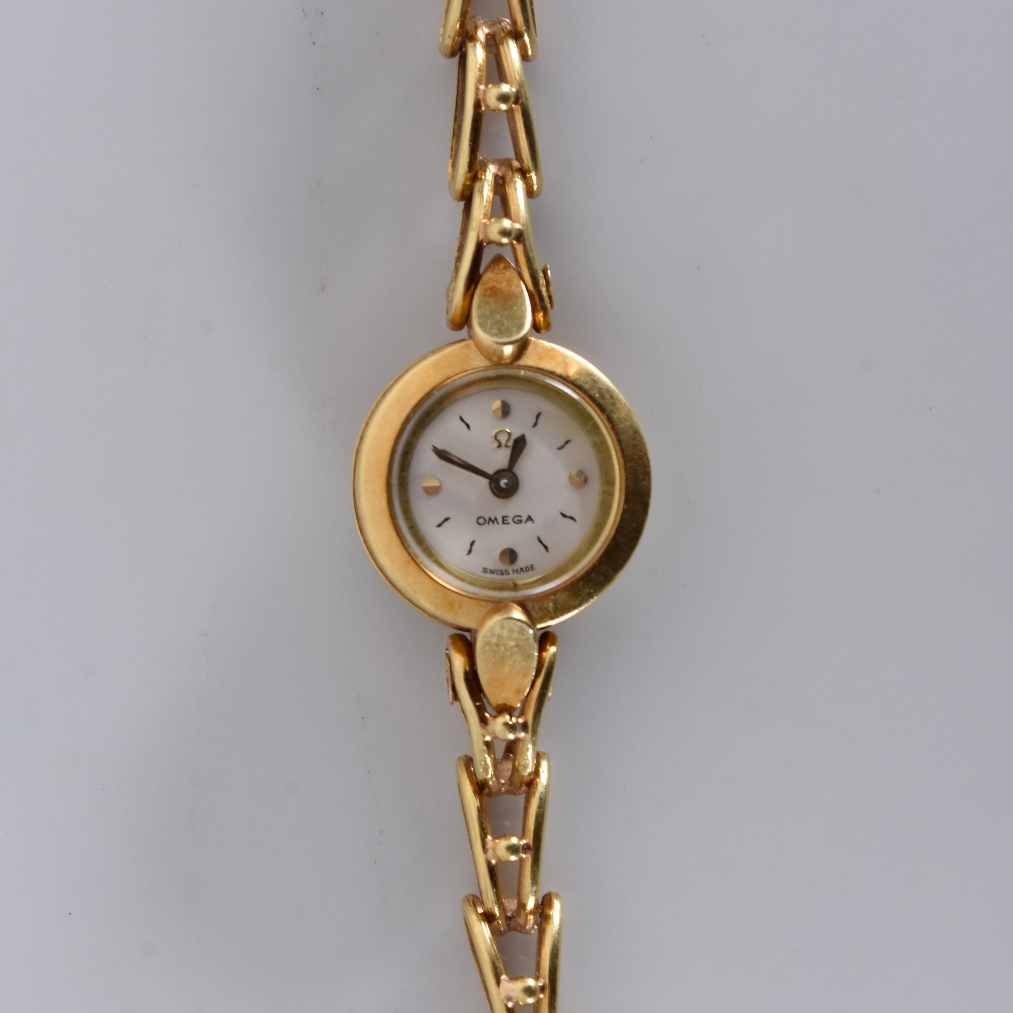DAMARMBANDSUR, Omega, 18K.