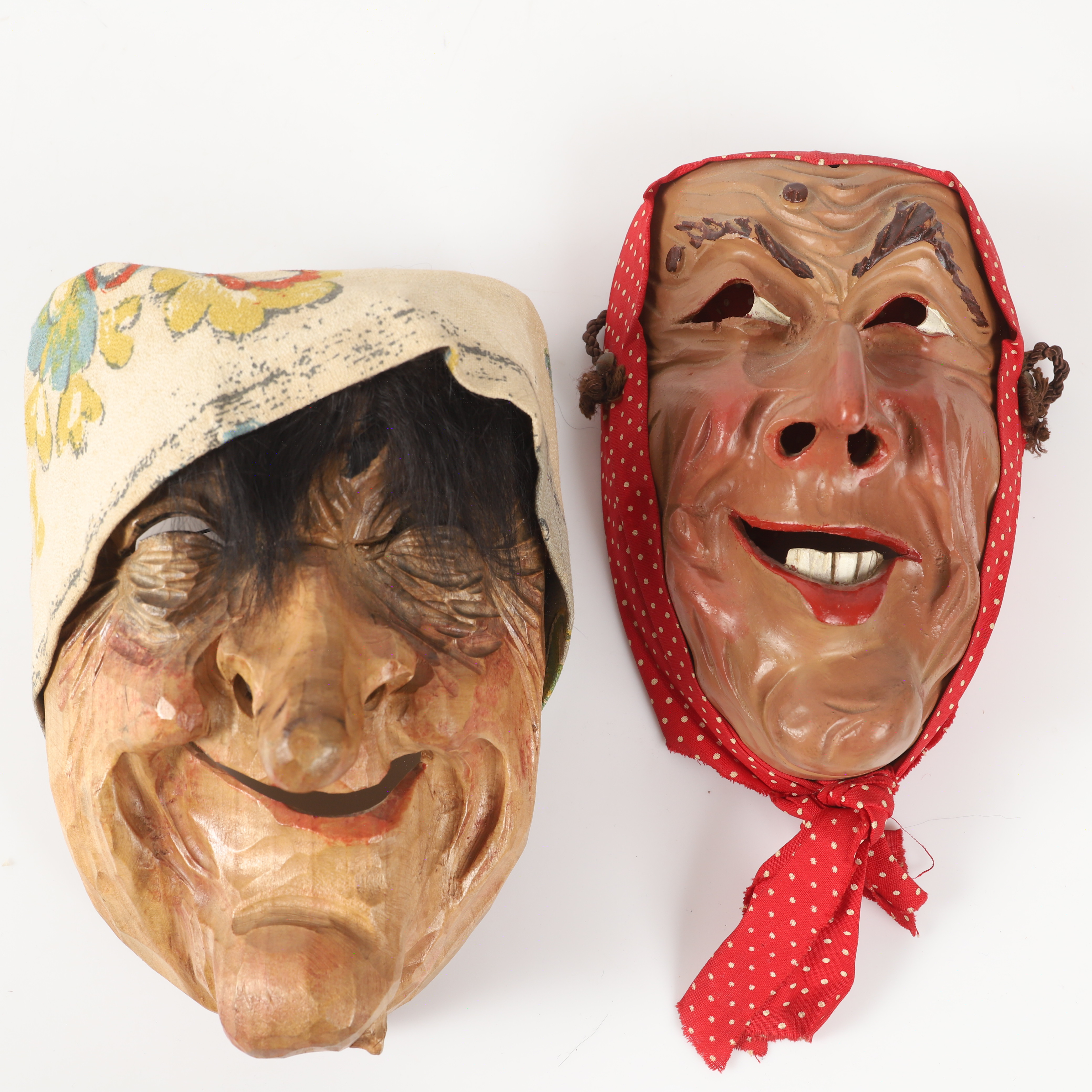 MASKER, 2 stycken påskkärringar, snidat trä, signerade, 1900-talets mitt.