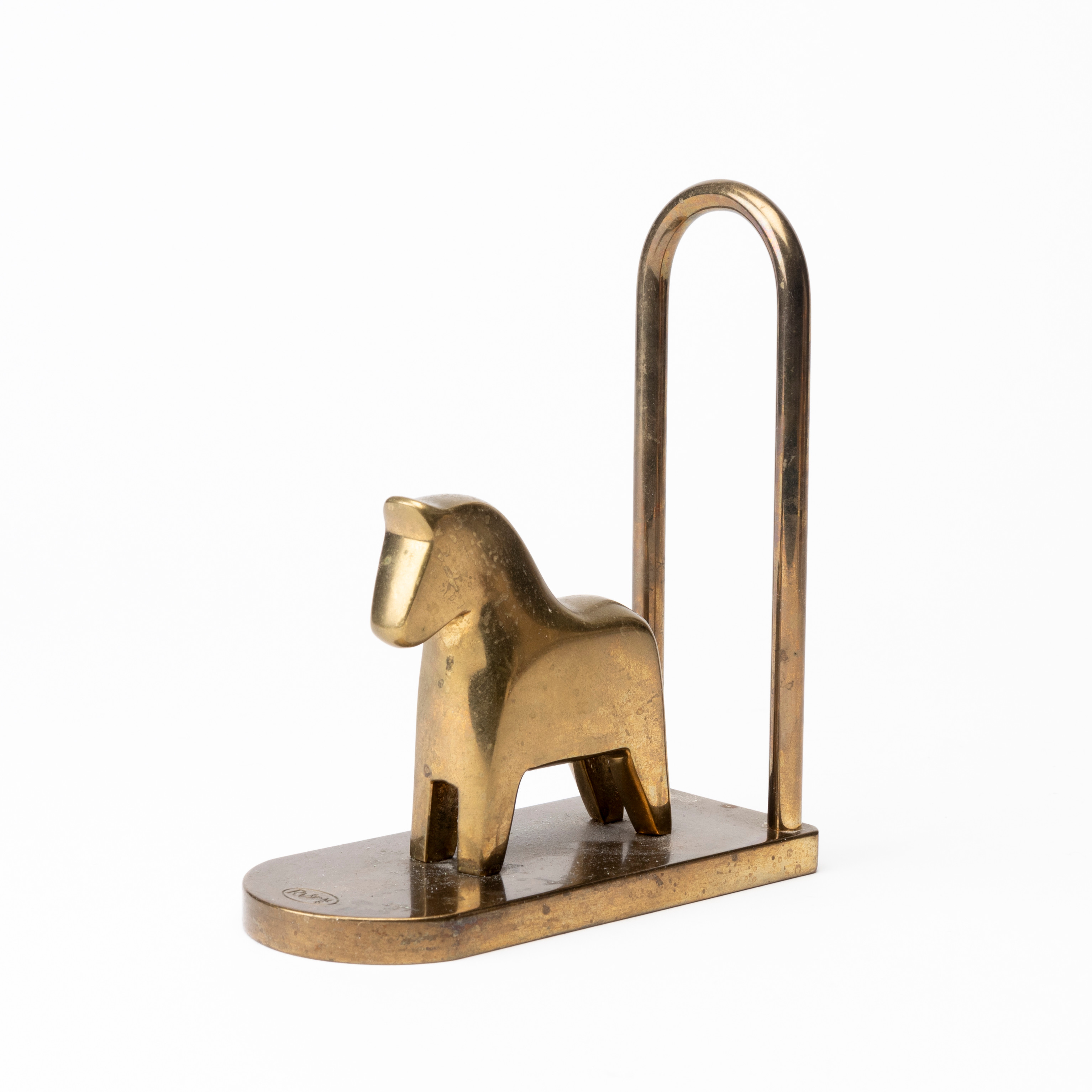 LOTTA HORN. Bokstöd, mässing, Reijmyre mässingsbruk.