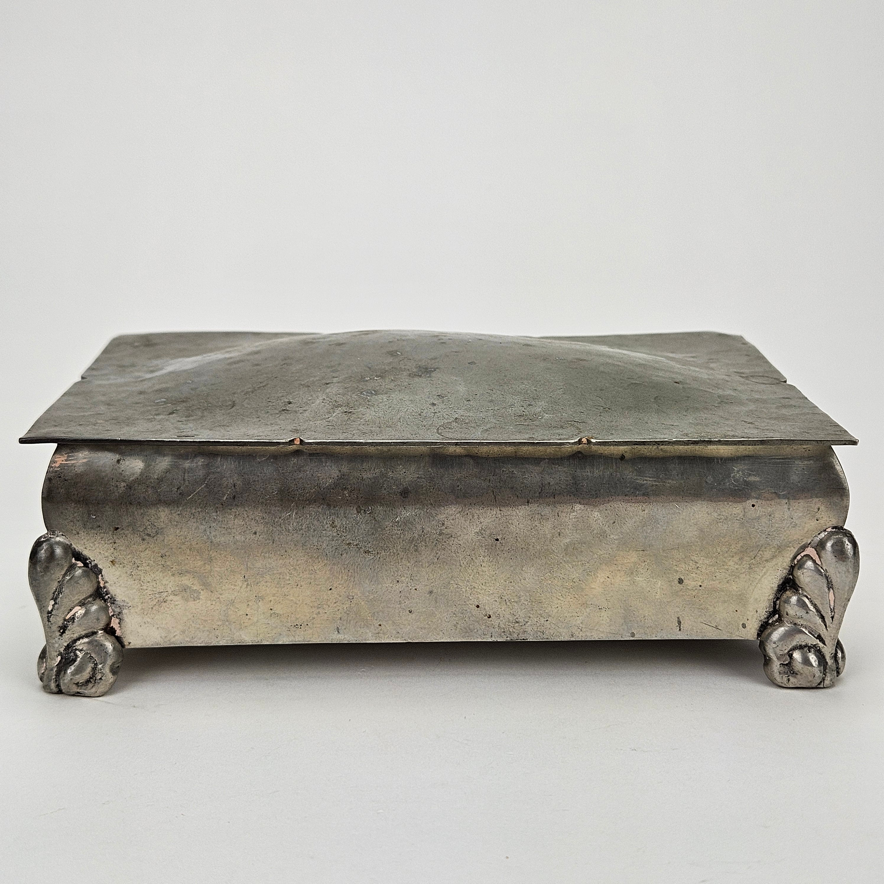 SKRIN, tenn, 1900-talets första hälft.