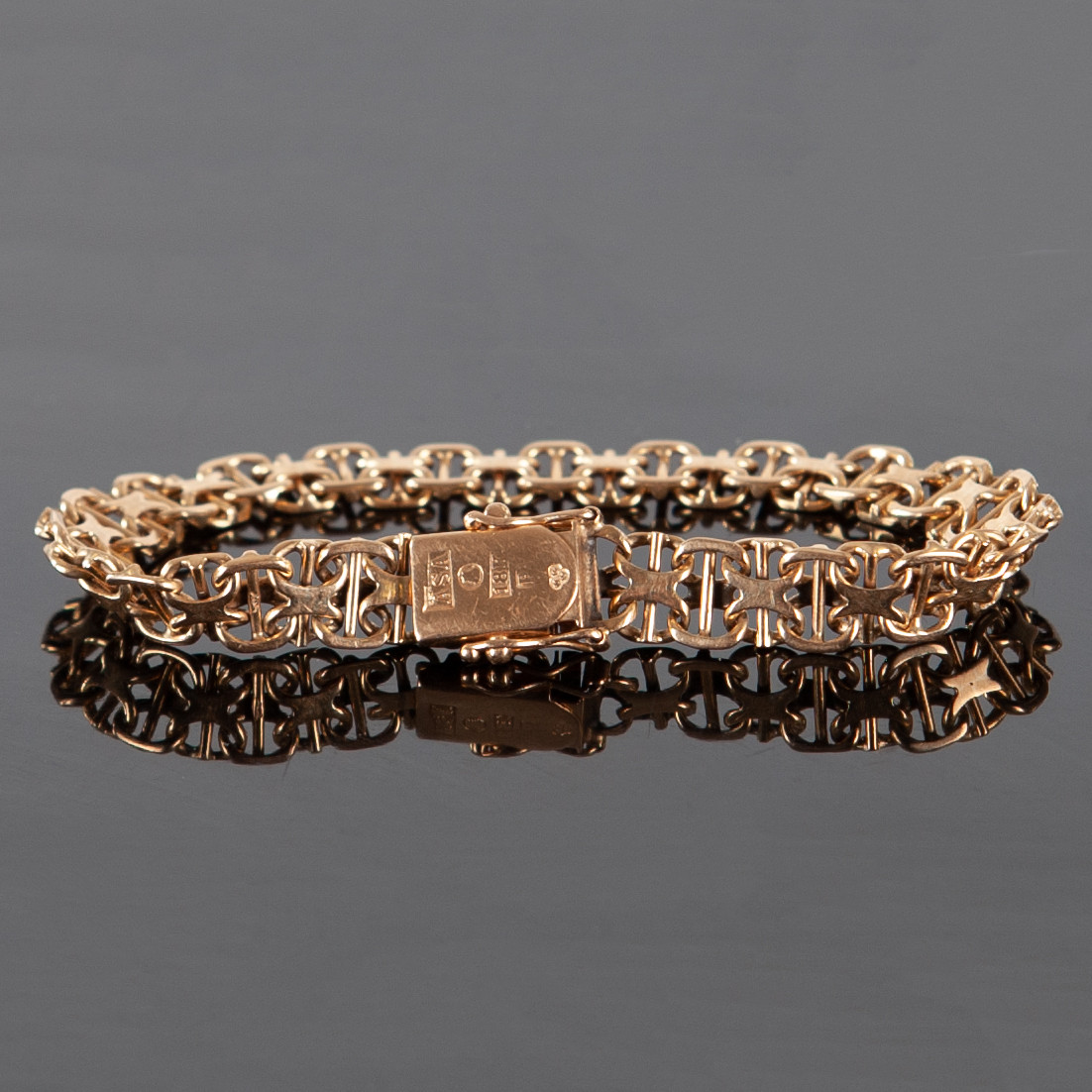 ARMBAND , X-LÄNK MED STAV, 18 K GULD. 22.04 g.