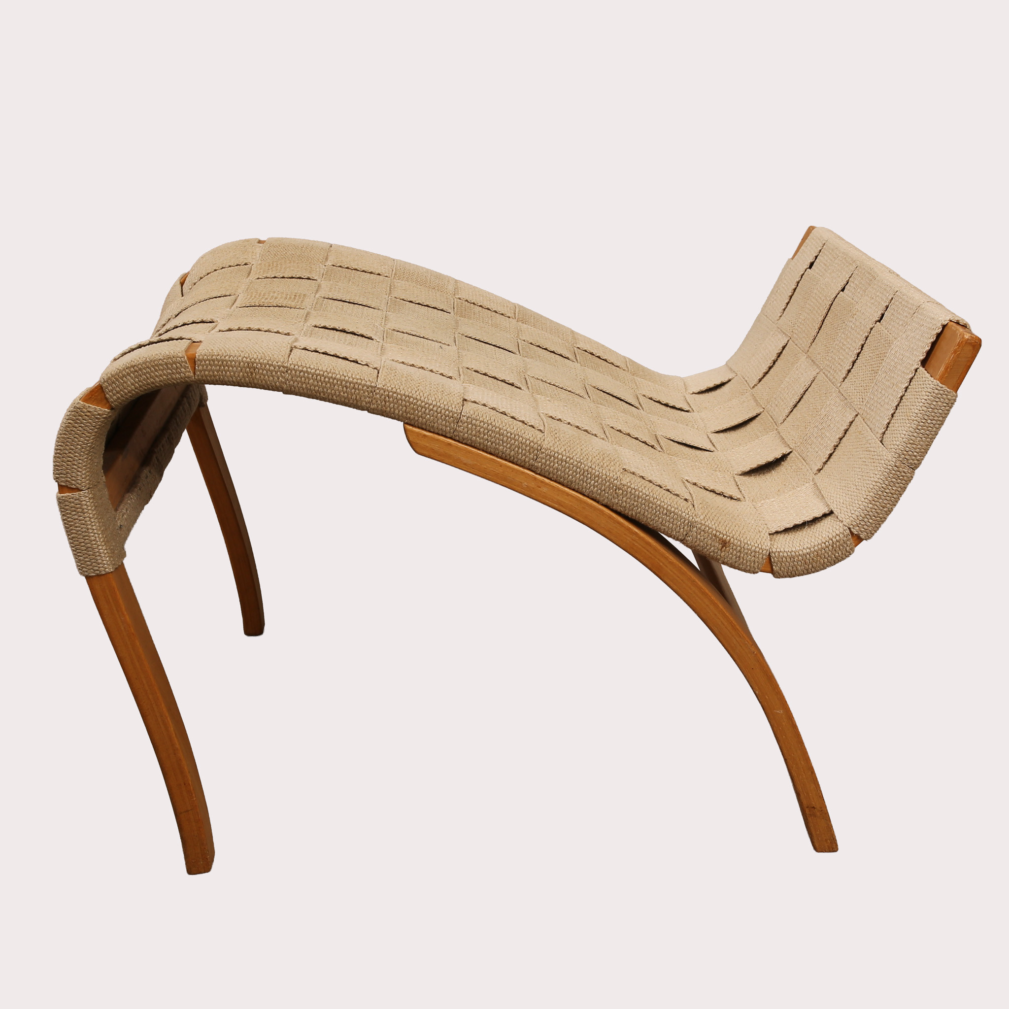 BRUNO MATHSSON. Fotpall, bok med flätad sadelgjord, "Pernilla", Dux, 1900- talets fjärde kvartal.