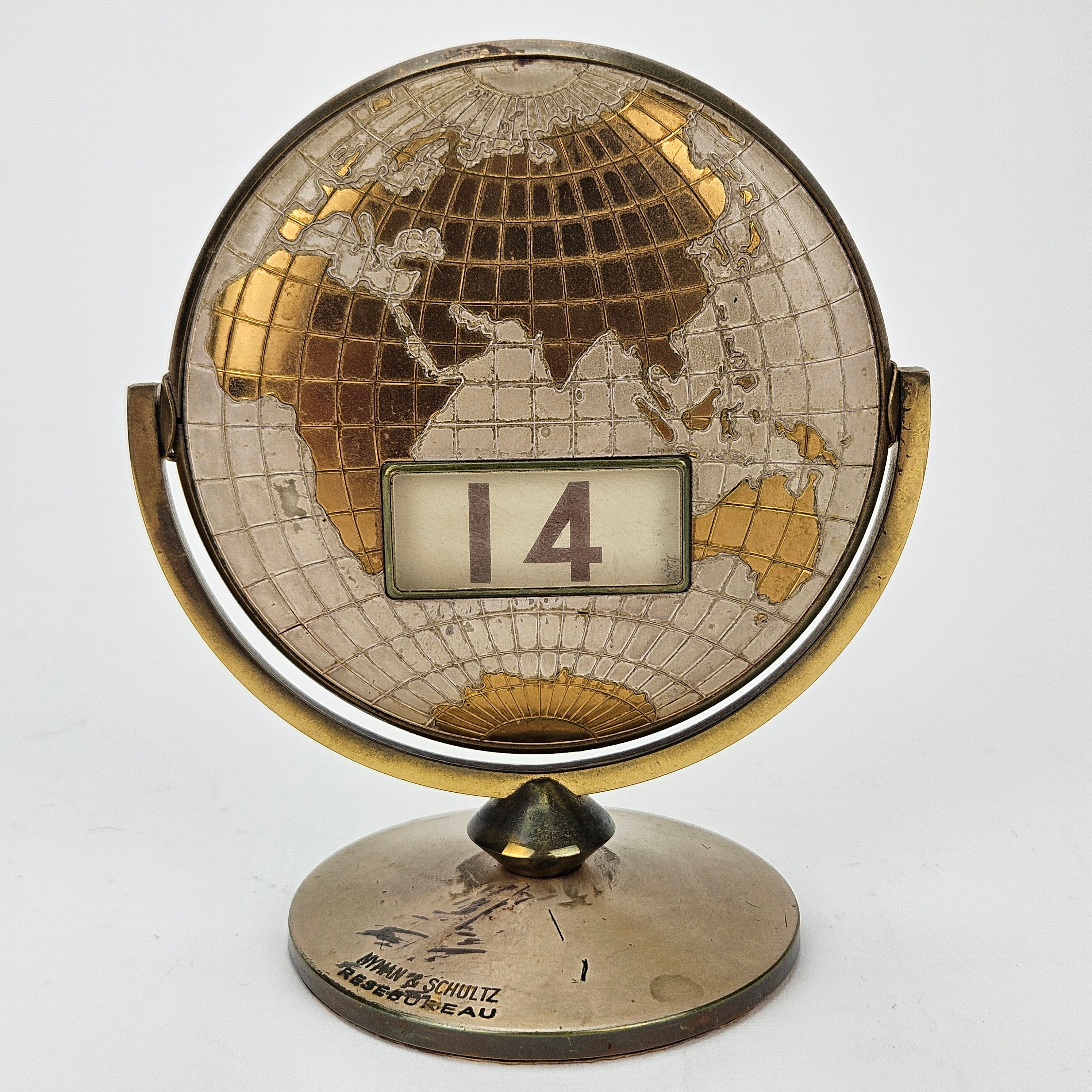 KALENDER, i form av jordglob, Nyman & Schultz Resebureau, 1900-tal.