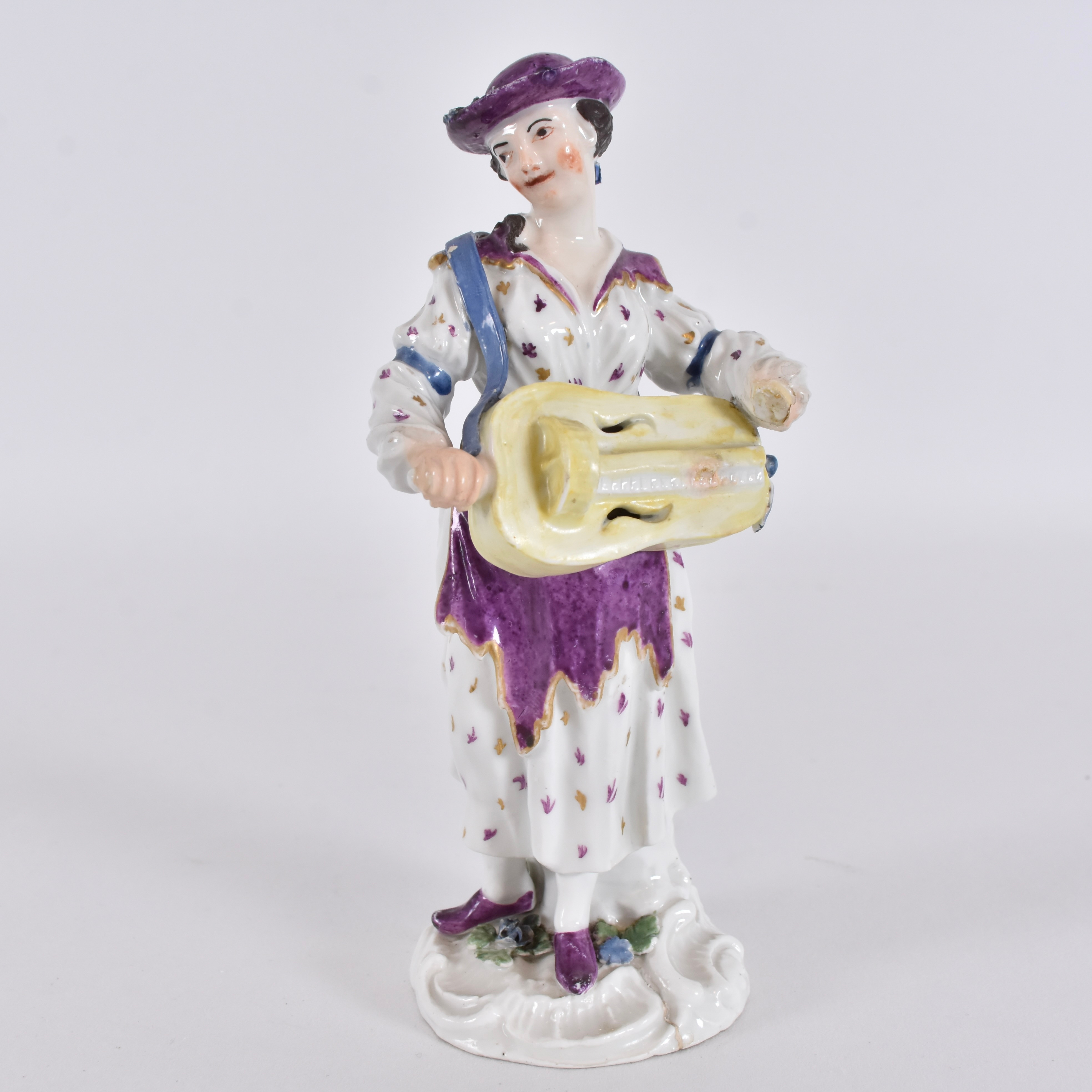 FIGURIN, delvis bemålat porslin, möjligen Meissen, 1800-tal.