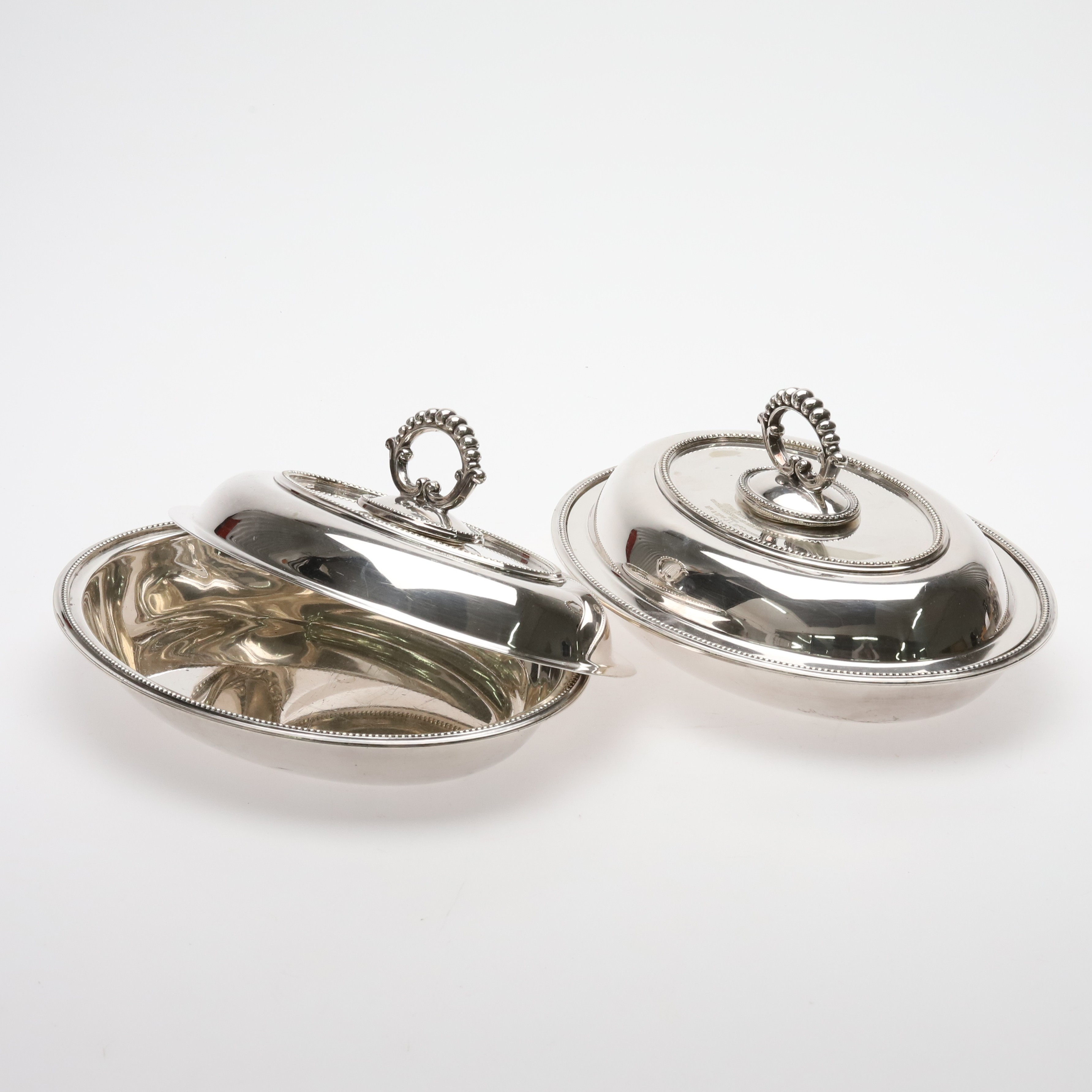 KAROTTER. Ett par. Nysilver, Cross Arrows, 1900-talets första kvartal.