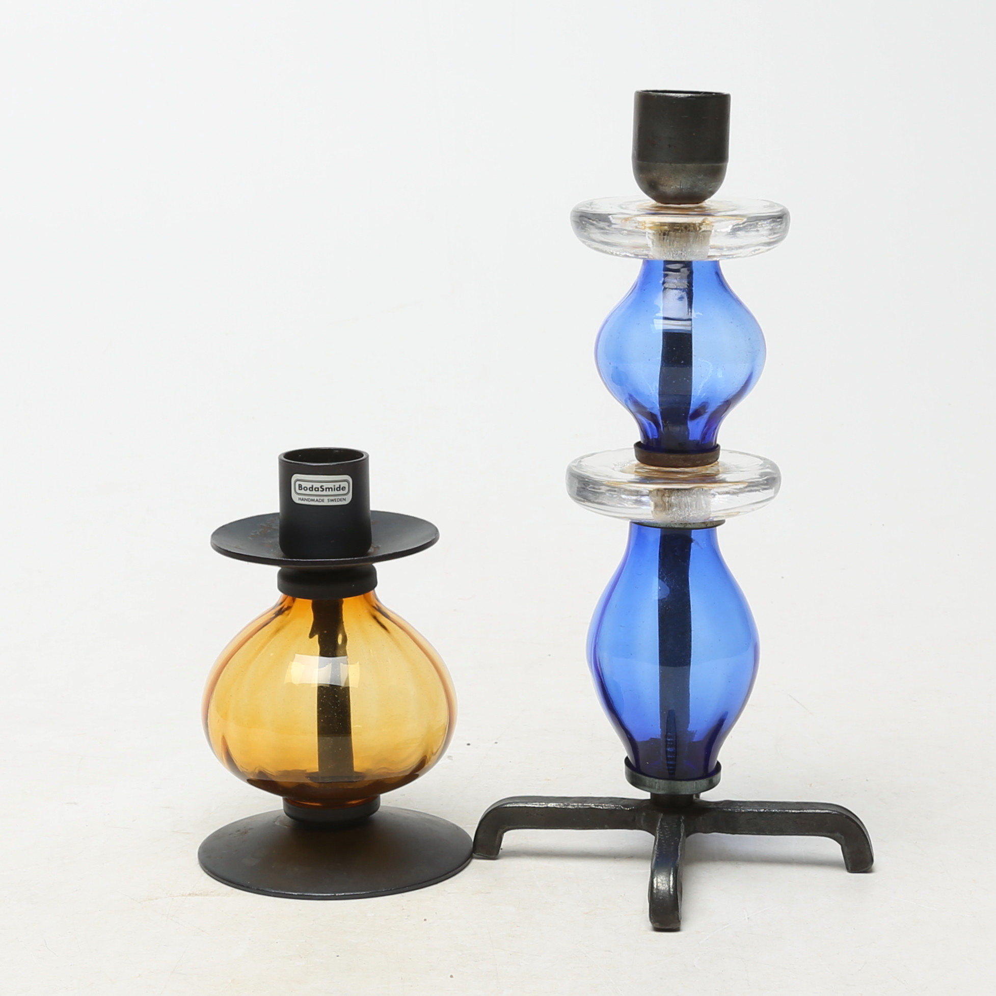 ERIK HÖGLUND. LJUSSTAKAR, 2 st, glas/järn, Bodasmide.