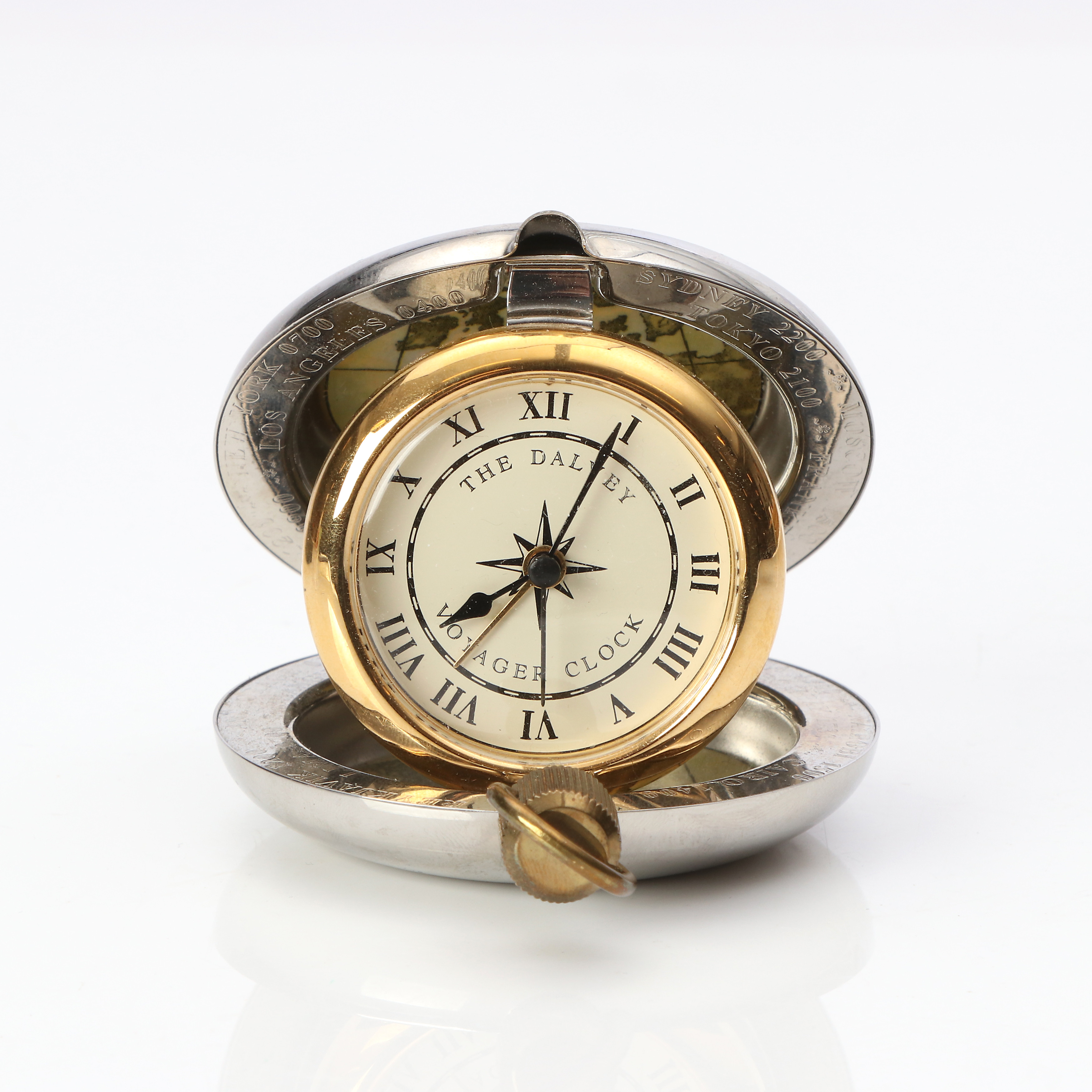 DALVEY VOYAGER CLOCK. Vitmetall och mässing. 1993.