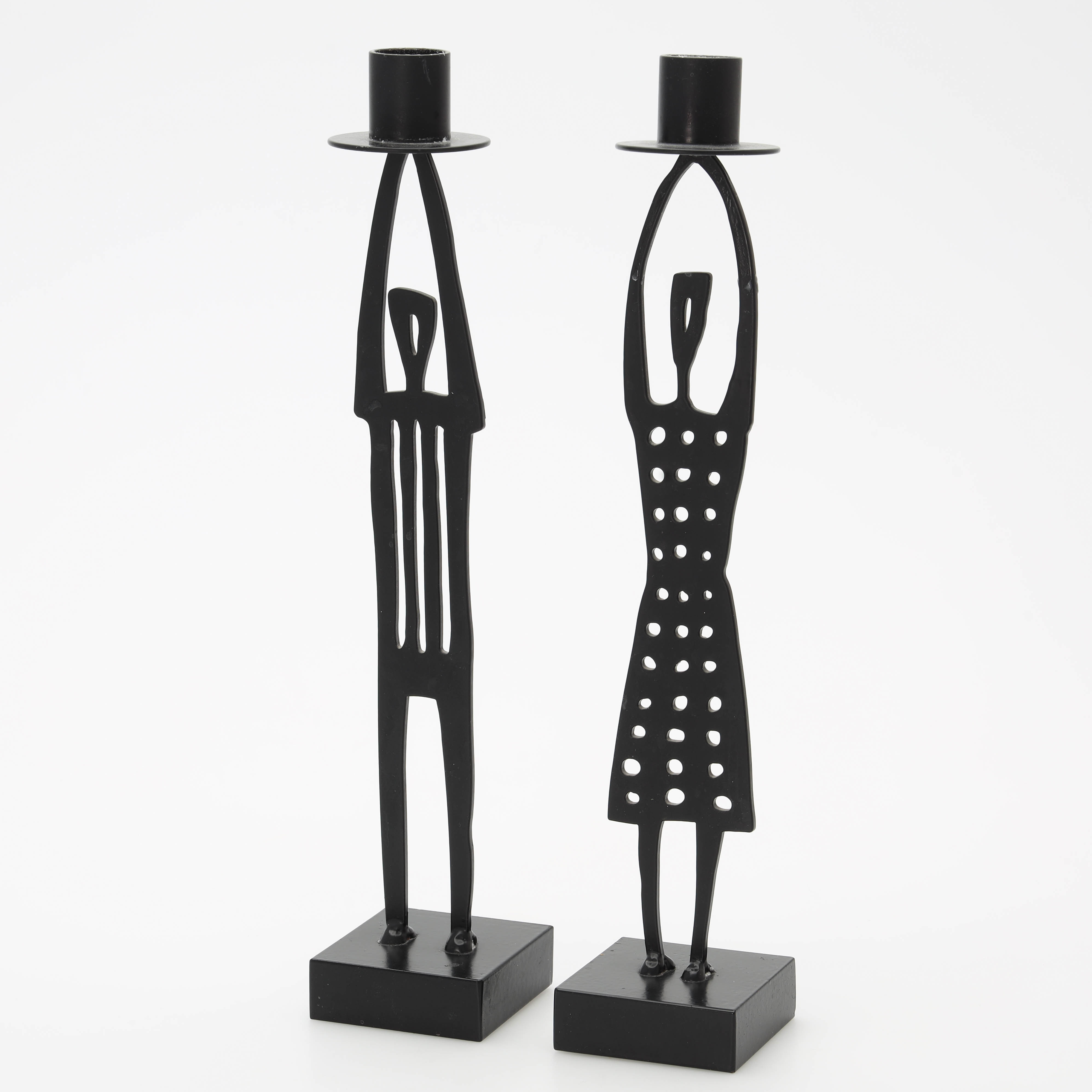 BENGT LINDBERG. Ett par, lackat järn, gestalt av man och kvinna.