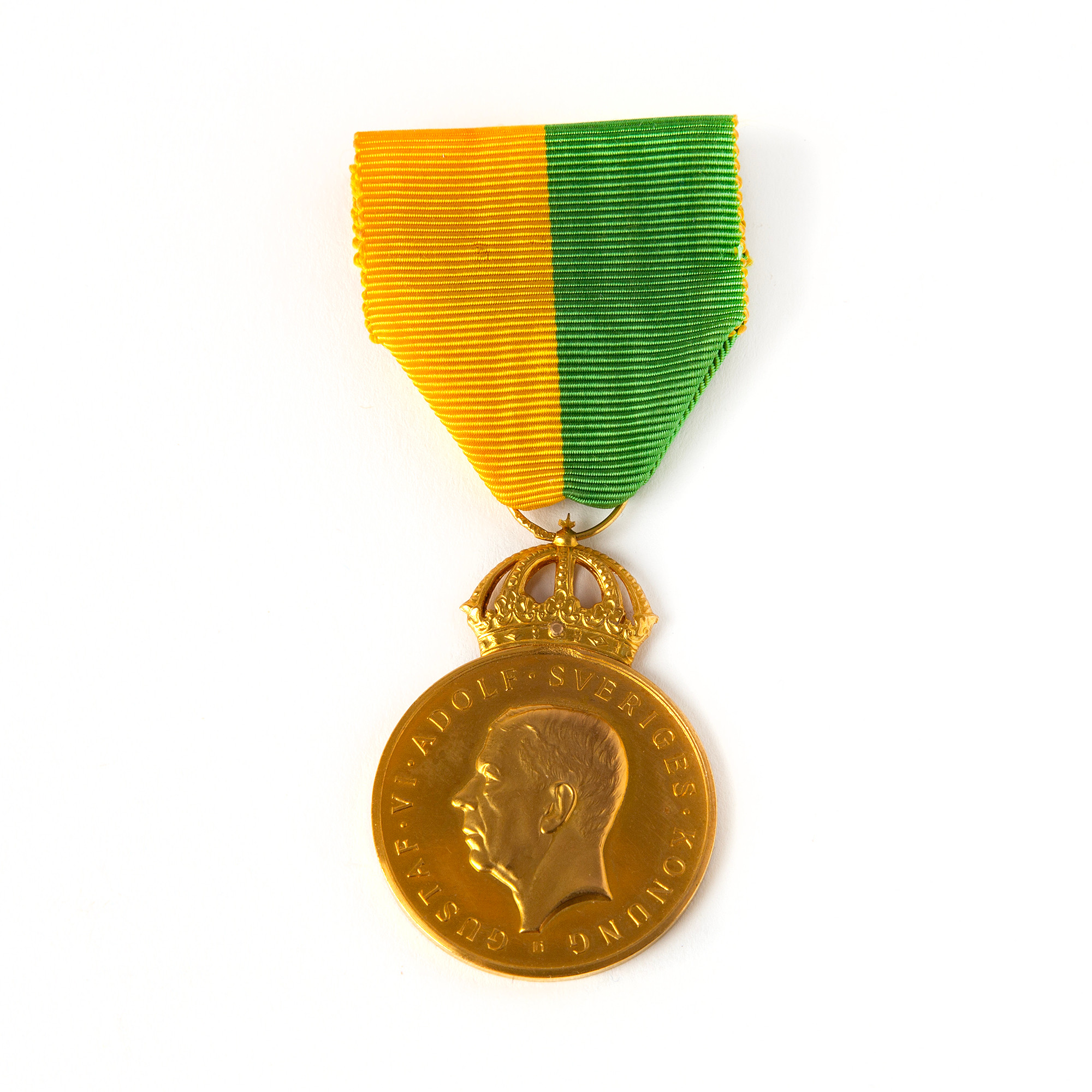 FÖRTJÄNSTMEDALJ. Kungliga Patriotiska sällskapet, "För långvarig trogen tjänst", 23K/18K guld.