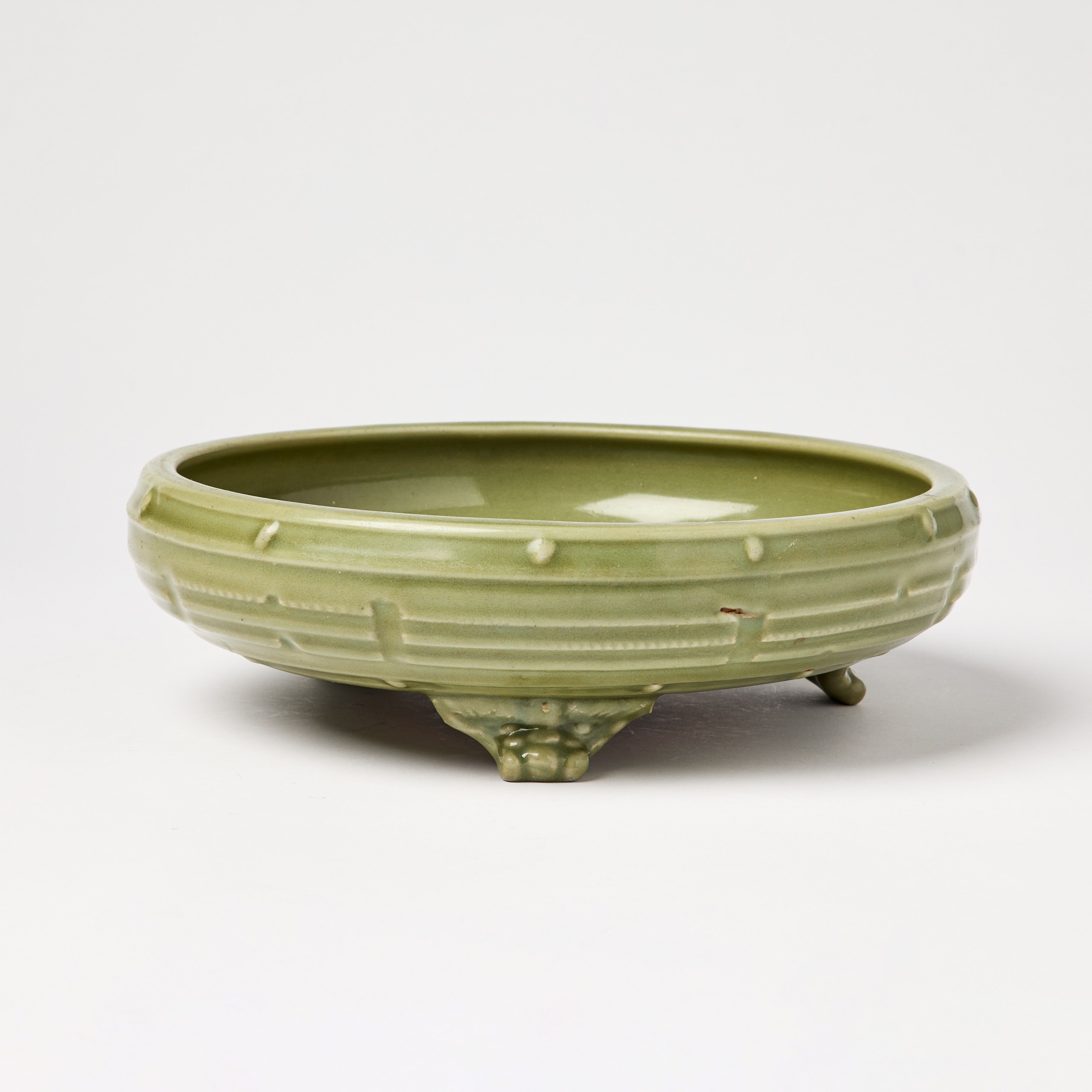 A Chinese 'Longquan' Celadon-Glazed 'Eight Trigrams' Tripod Censer.