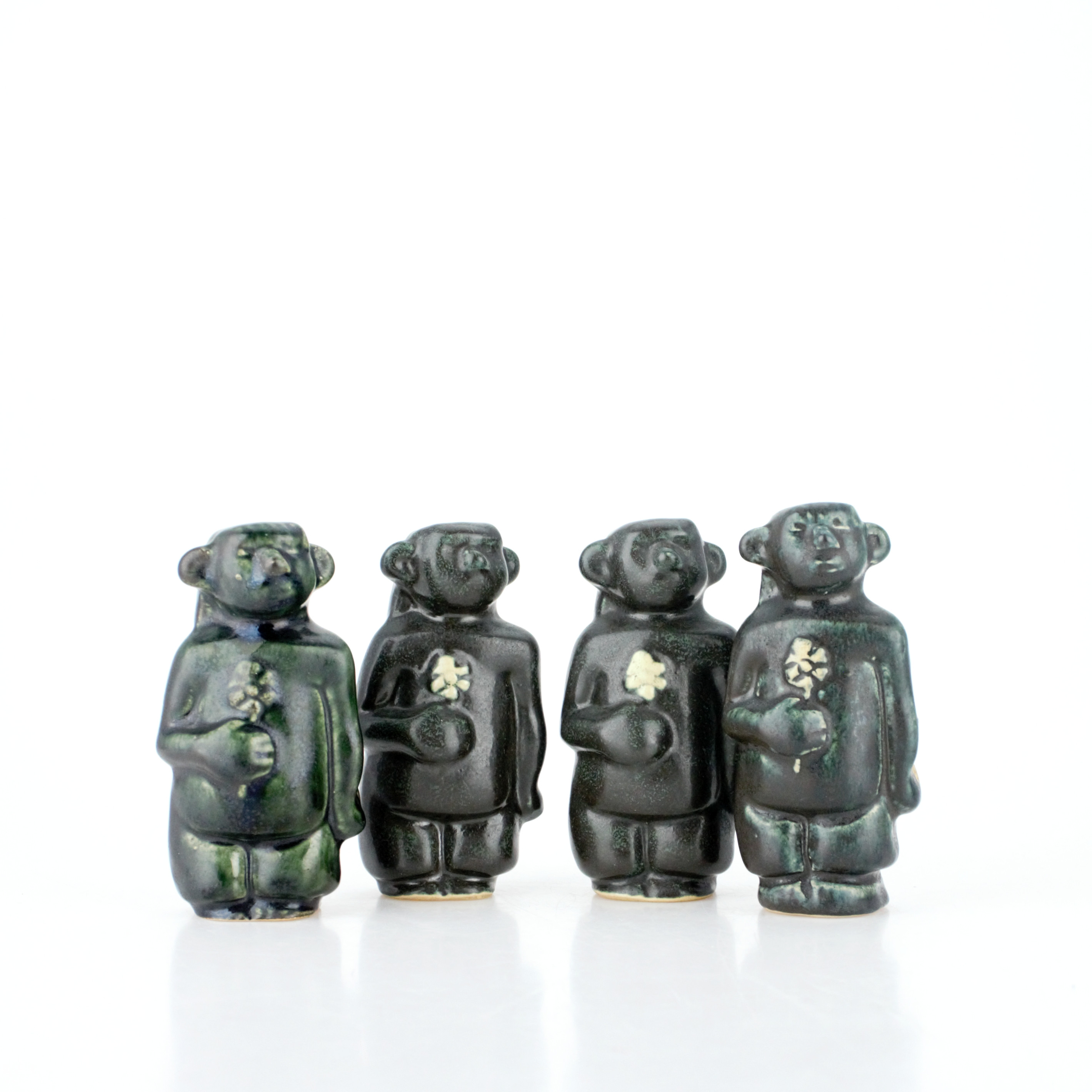 ÅKE HOLM. Figuriner, 4 st. "Kullatroll", glaserat stengods, signerade.