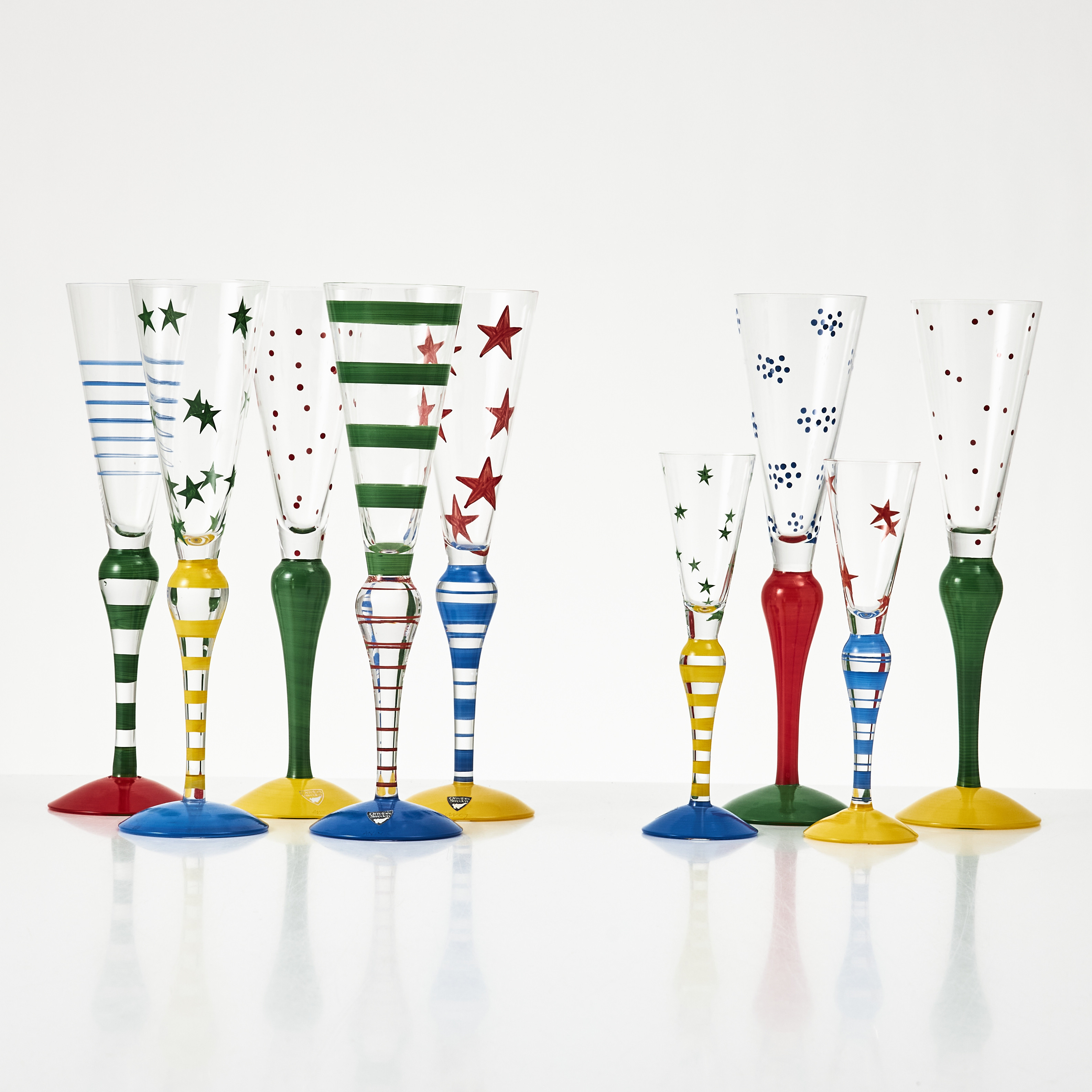 ANNE NILSSON. "Clown", 7 st. champagneglas och 2 st. snapsglas, Orrefors, signerade.
