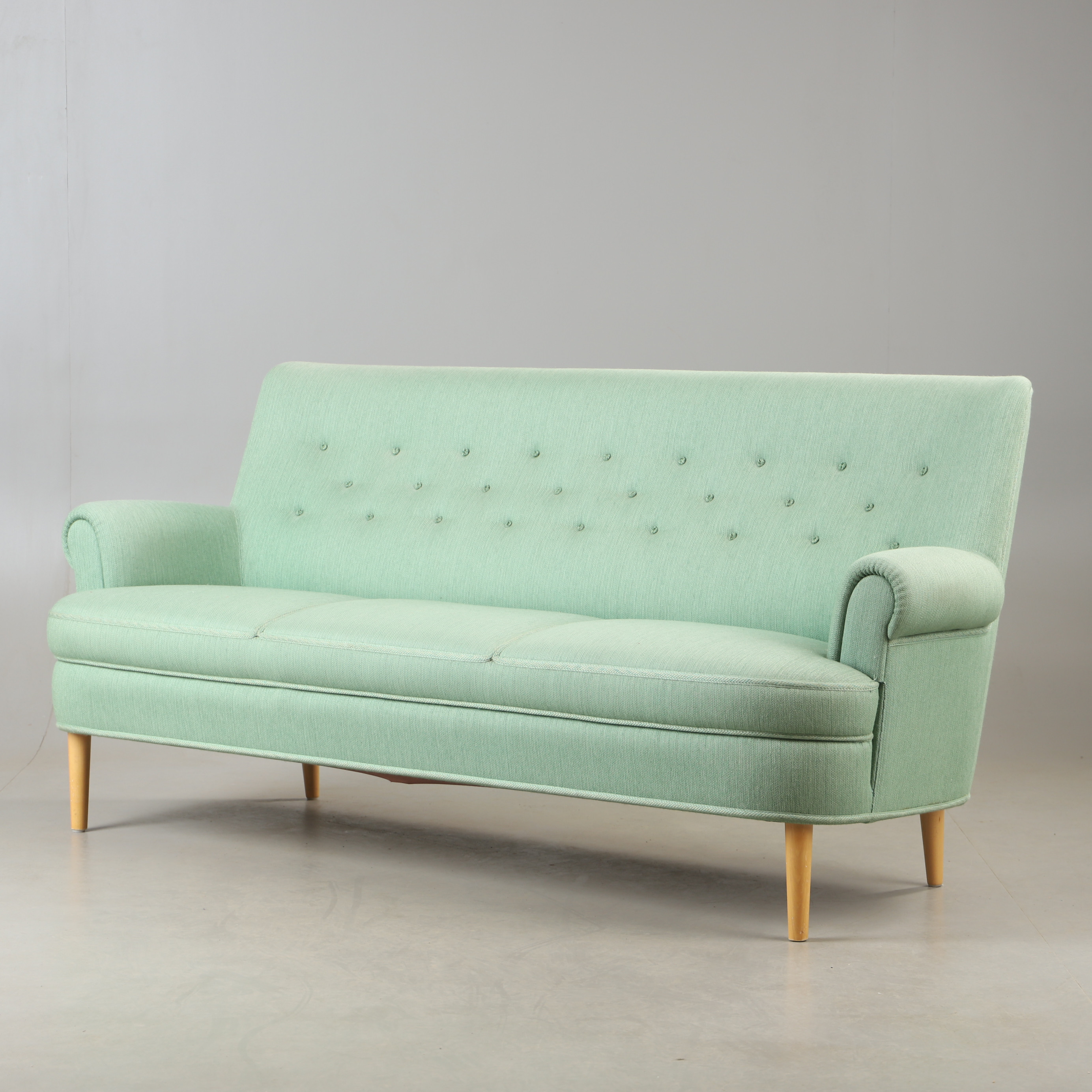 CARL MALMSTEN. Soffa, "Hemmakväll", bok med textilklädsel, 1900-tal.